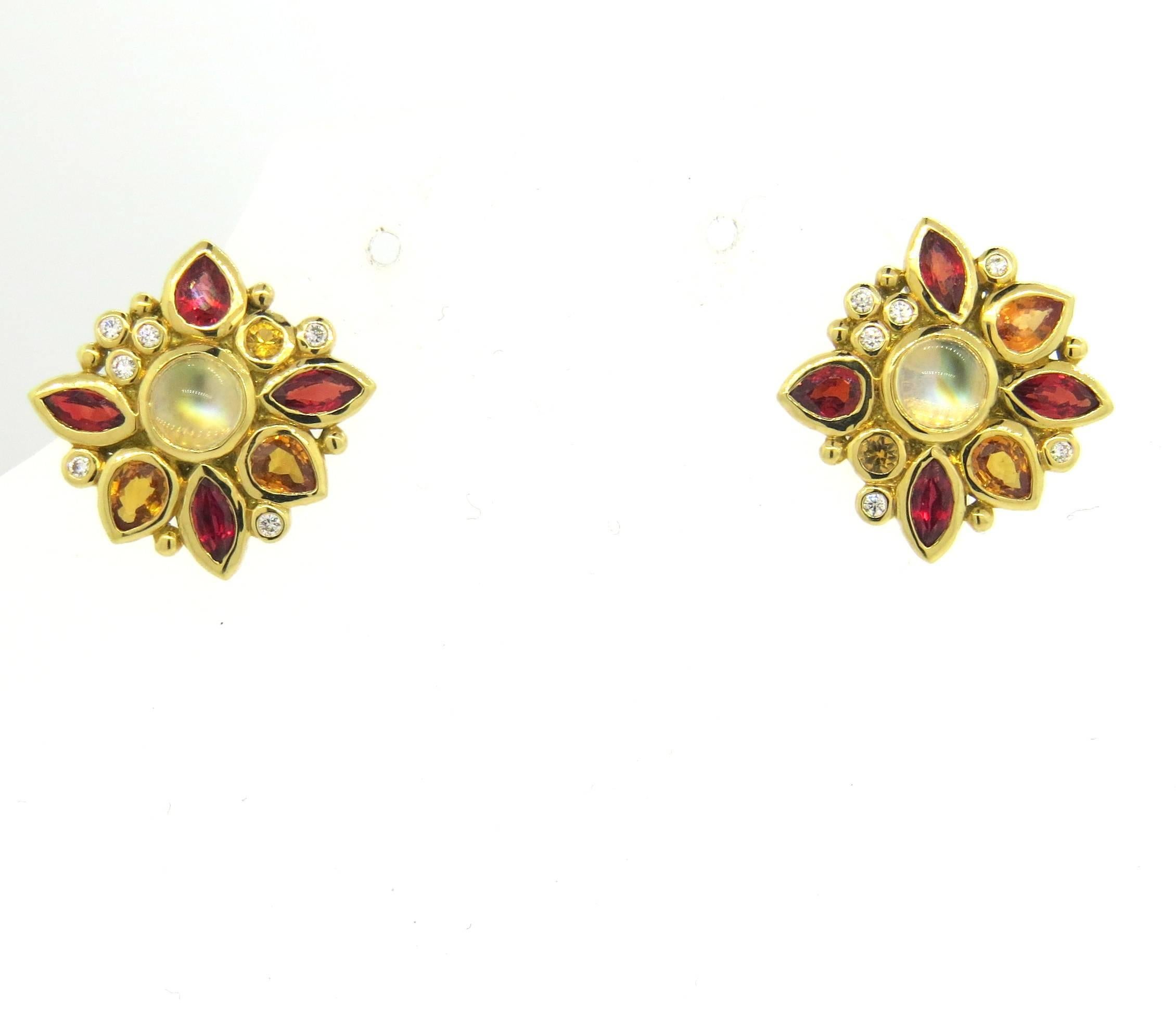 Pair of new 18k yellow gold earrings, crafted by Temple St. Clair for Anima collection, decorated with 0.13ctw in G/VS diamonds, orange and red sapphires and moonstone. Earrings are 19mm x 20mm. Marked with Temple mark and 750. Weight - 8.7