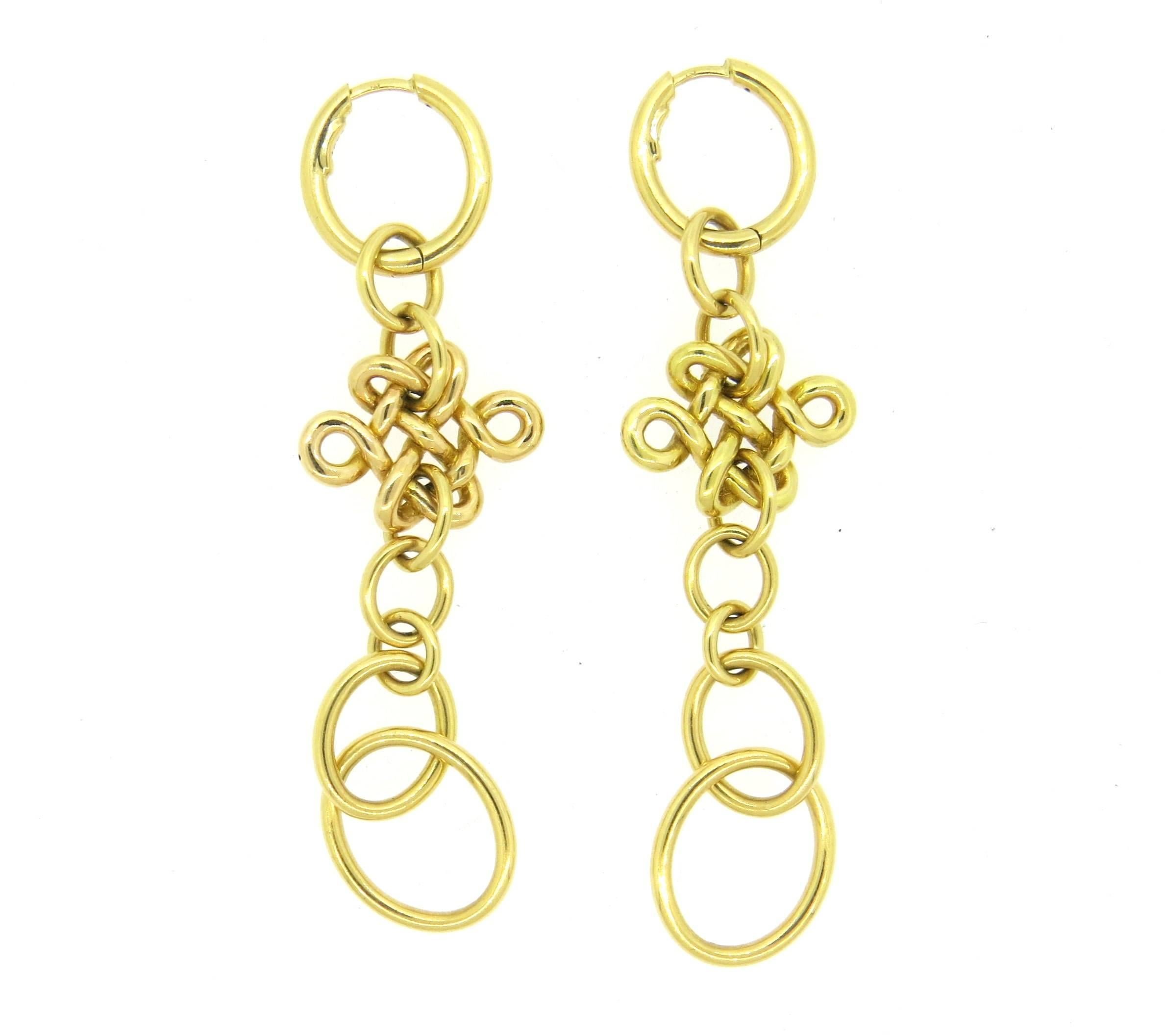 Pair of long 18k yellow gold earrings, crafted by H Stern in collaboration with Diane von Furstenberg. Earrings are 80mm long x 21mm wide. Marked: 750, Star mark. Weight - 10 grams 