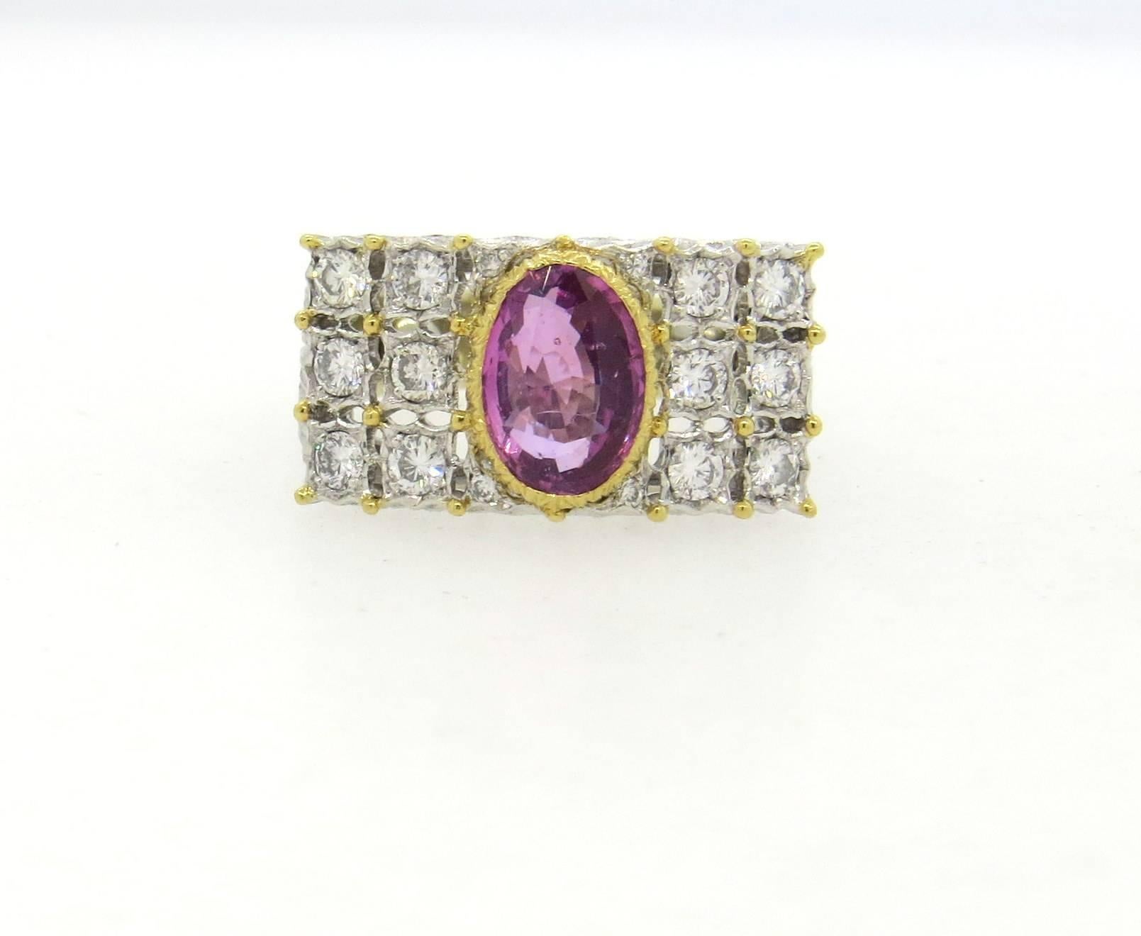 Beautiful 18k white and yellow gold ring, crafted by Buccellati, set with 8.6mm x 6.1mm pink sapphire, surrounded with approx. 0.60ctw in G/VS diamonds. Ring is a size 6 (sizing balls can be removed to increase size)  top of the ring is 11mm x 20mm.