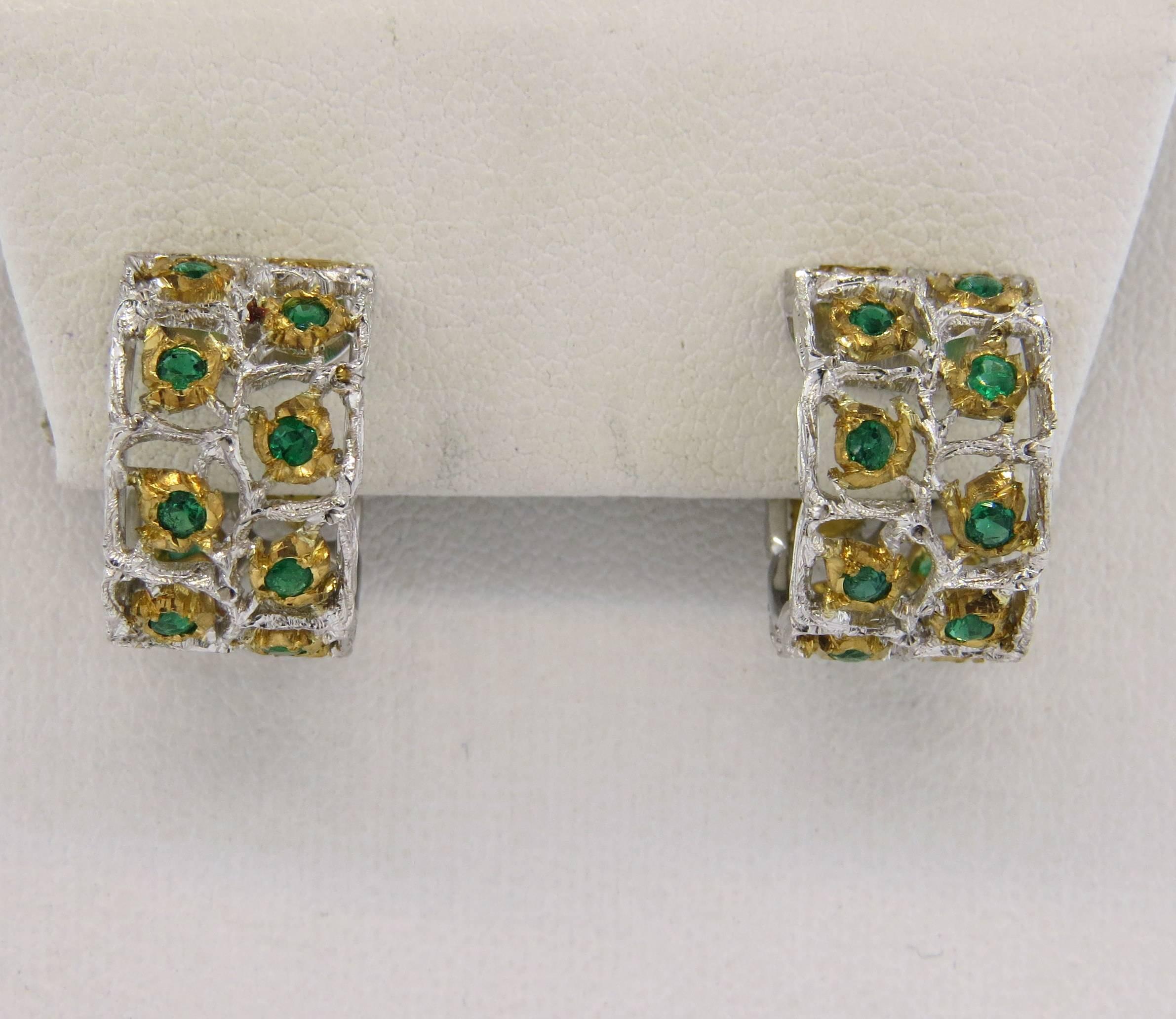 A pair of 18k white and yellow gold hoops, crafted by Buccellati, set with 0.66ctw in emeralds. Earrings are 17mm in diameter x 10.5mm wide. Marked: Buccellati Italy 18k. Weight - 10 grams
Come with original Buccellati paperwork