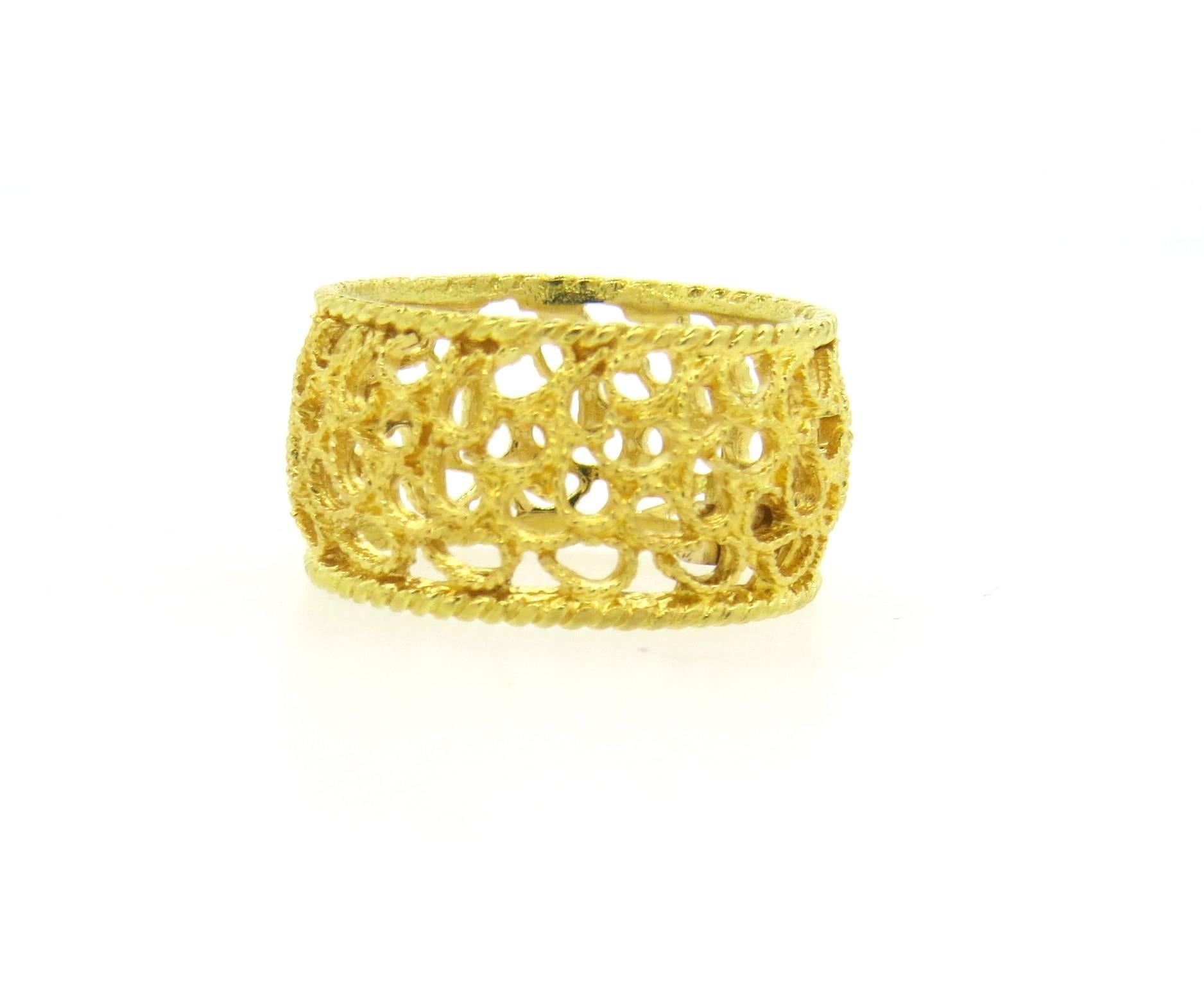 Wide 18k yellow gold ring, crafted by Buccellati. Ring is a size 6 and is 10.5mm wide. Marked: Buccellati, 750. Weight of the piece - 4.6 grams