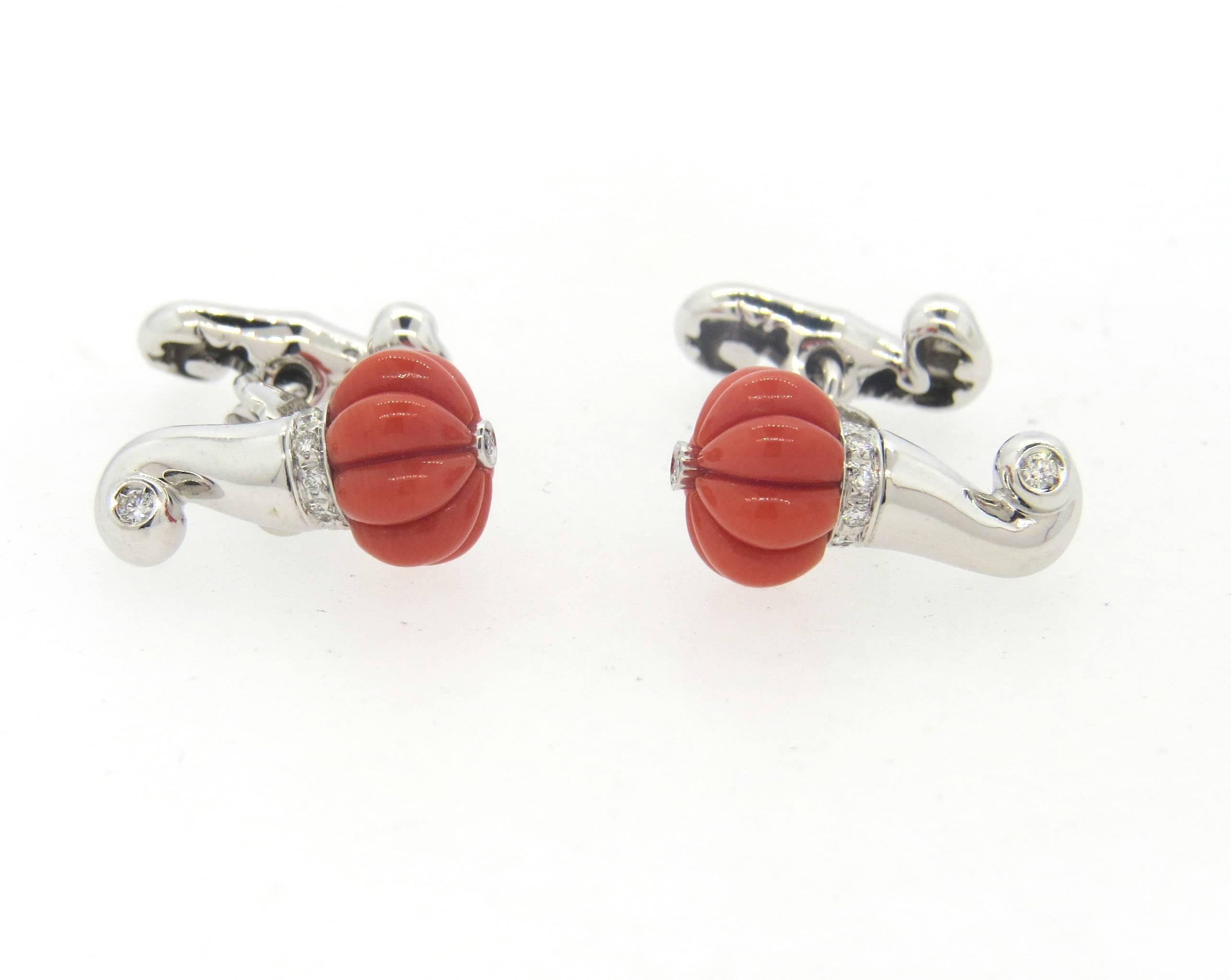 A pair of 18k white gold cufflinks, crafted by Chantecler, featuring carved coral tops, decorated with approximately 0.15ctw in diamonds. Cufflink top measures 18mm x 10mm, back - 15mm x 5mm. Marked: Italy, 18kt,1058MA, 750, Chantecler coral. Weight