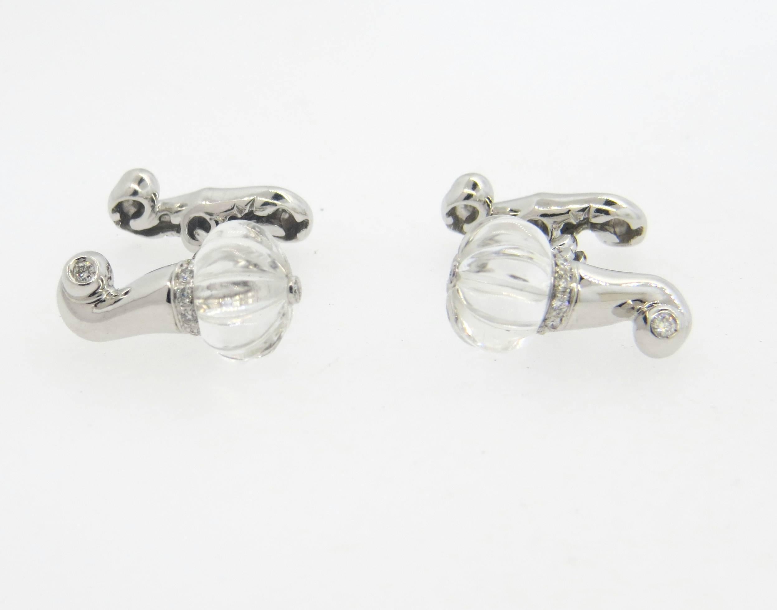 A pair of 18k white gold cufflinks, crafted by Chantecler, featuring carved crystal top, surrounded with 0.15ctw in diamonds. Cufflink top measures 17mm x 11mm, back - 15mm x 6mm. Marked: Chantecler capri, Italy, 18kt, 750, 1039NA. Weight - 9.9