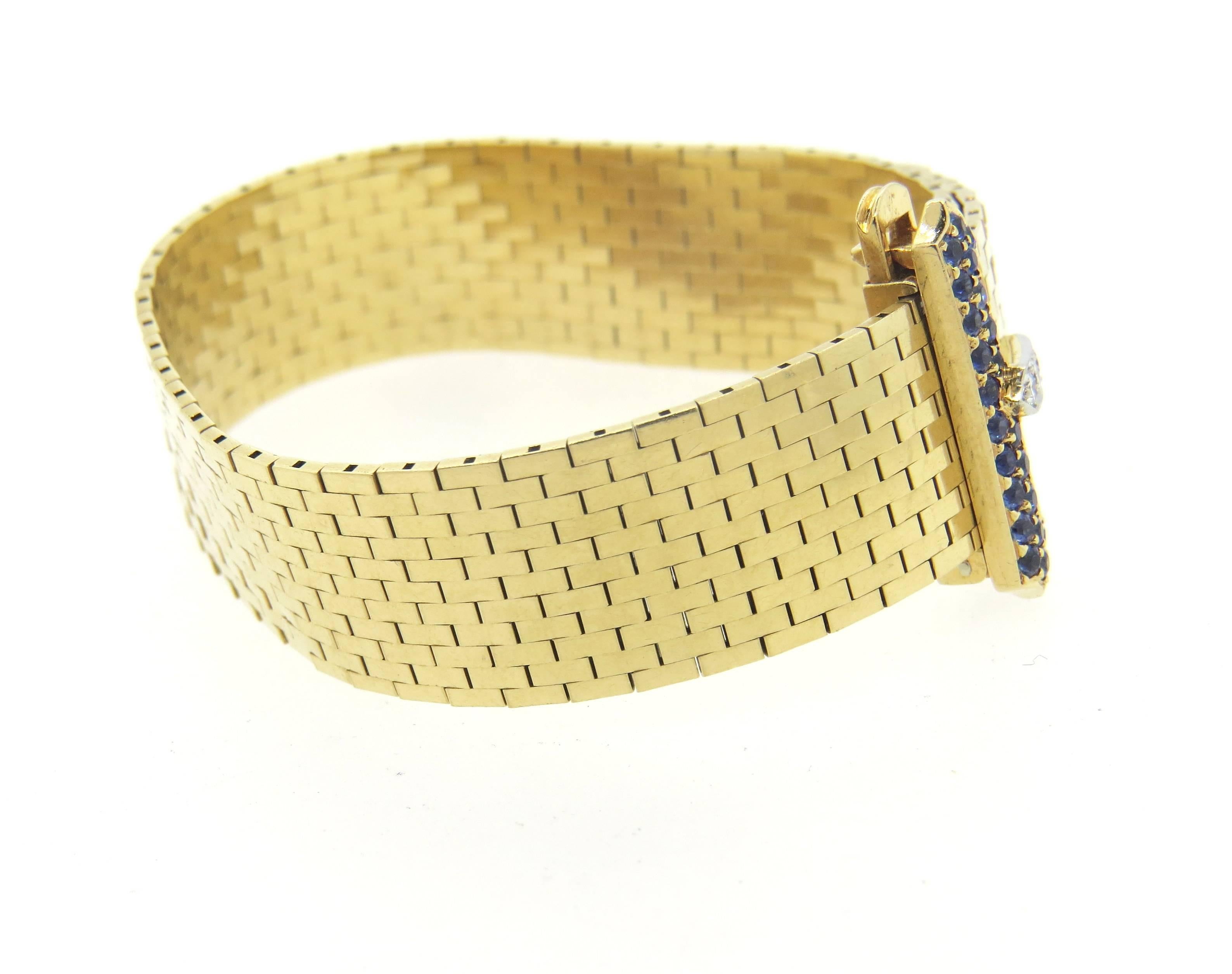 Retro 14k yellow gold bracelet, crafted by Tiffany & Co,decorated with blue sapphires and diamonds on the buckle. Bracelet is 7 7/8