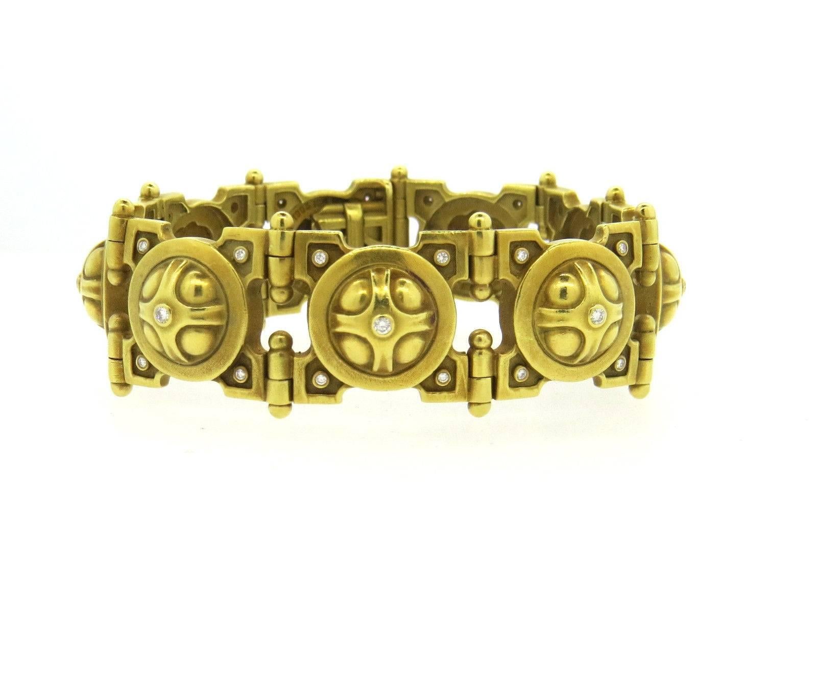 An 18k Yellow Gold set with diamonds.  Crafted by Kieselstein Cord, the  bracelet measures 7 1/4