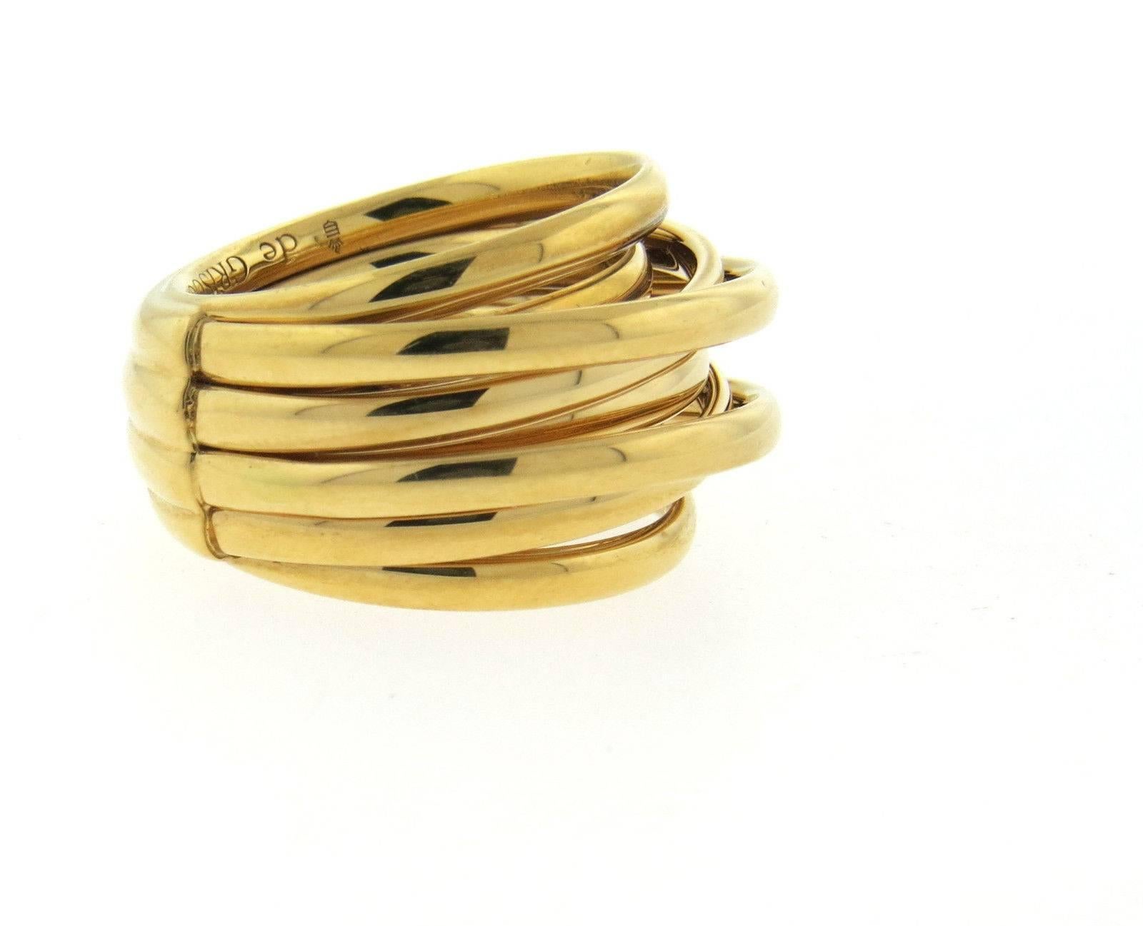 An 18k yellow gold ring crafted by De Grisogono for the Matassa collection.  The ring is a size 5 and 17mm wide.  Marked: De Grisogono , Au750.  The weight of the ring is 28 grams.