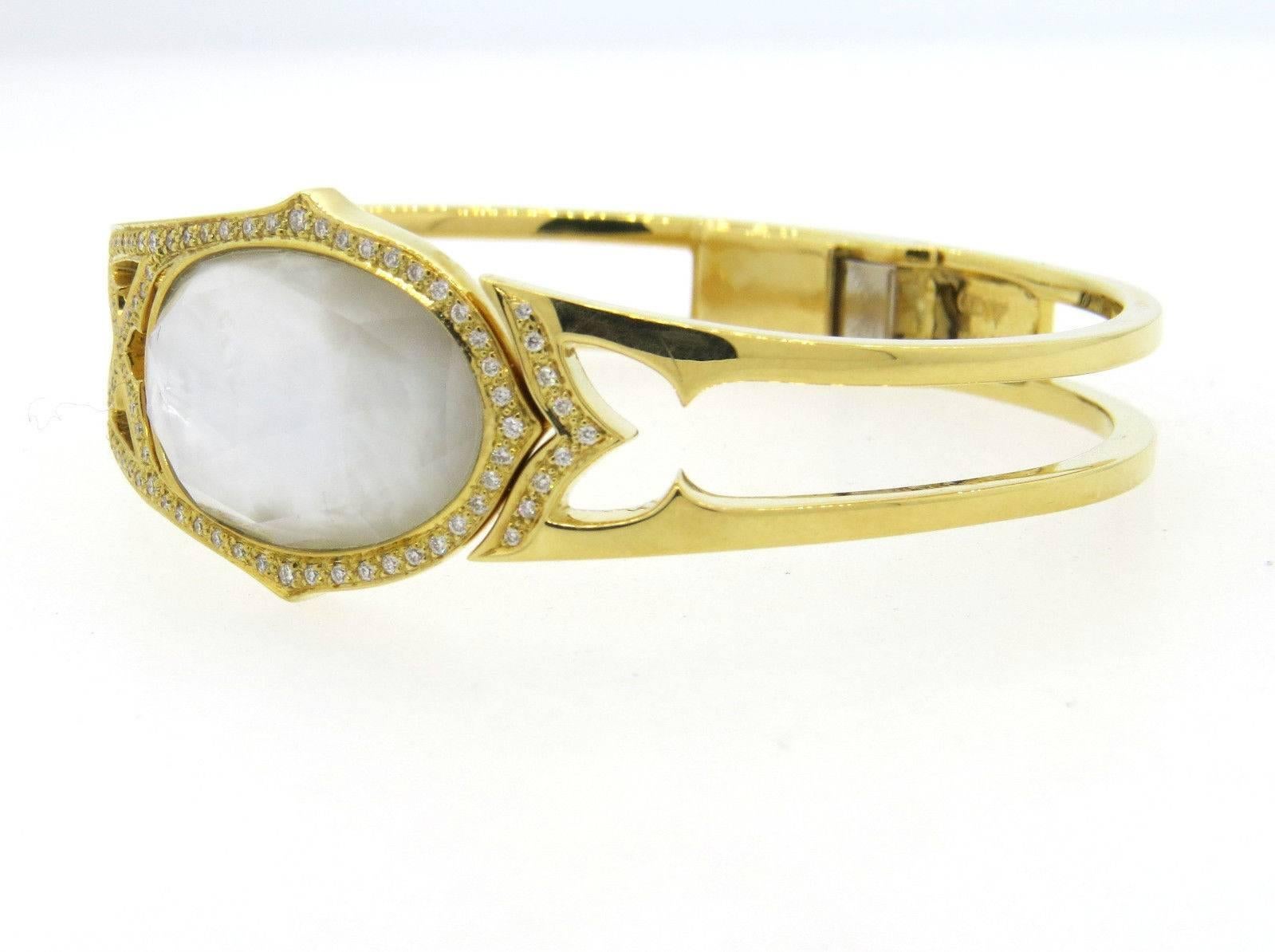 An 18k Yellow Gold adorned with crystal, backed with mother of pearl and 0.28ctw of G/VS diamonds.  Crafted by Stephen Webster, the bracelet will fit up to 7