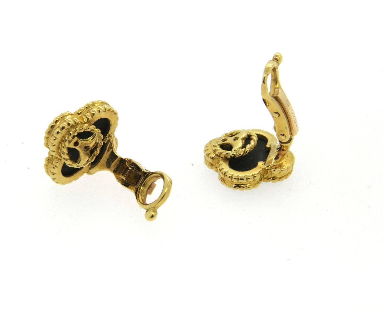 A pair of 18k yellow gold earrings set with onyx.  Crafted by Van Cleef & Arpels for their famous Vintage Alhambra collection, the earrings measure 15mm x 15mm and weigh 8.9 grams.  Marked: VCA,750,CL24044.  Retail: $4550