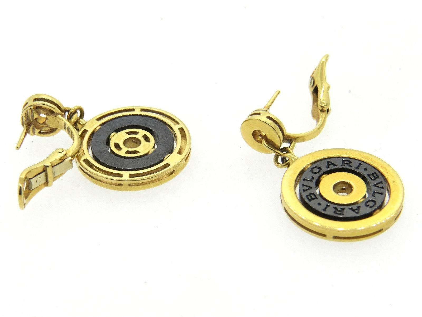 A pair of 18k yellow gold and black ceramic.  Crafted by Bulgari, the earrings are 35mm long x 21mm wide.  Marked: Bvlgari, 750, made in Italy.  The weight of the earrings is 21.7 grams.