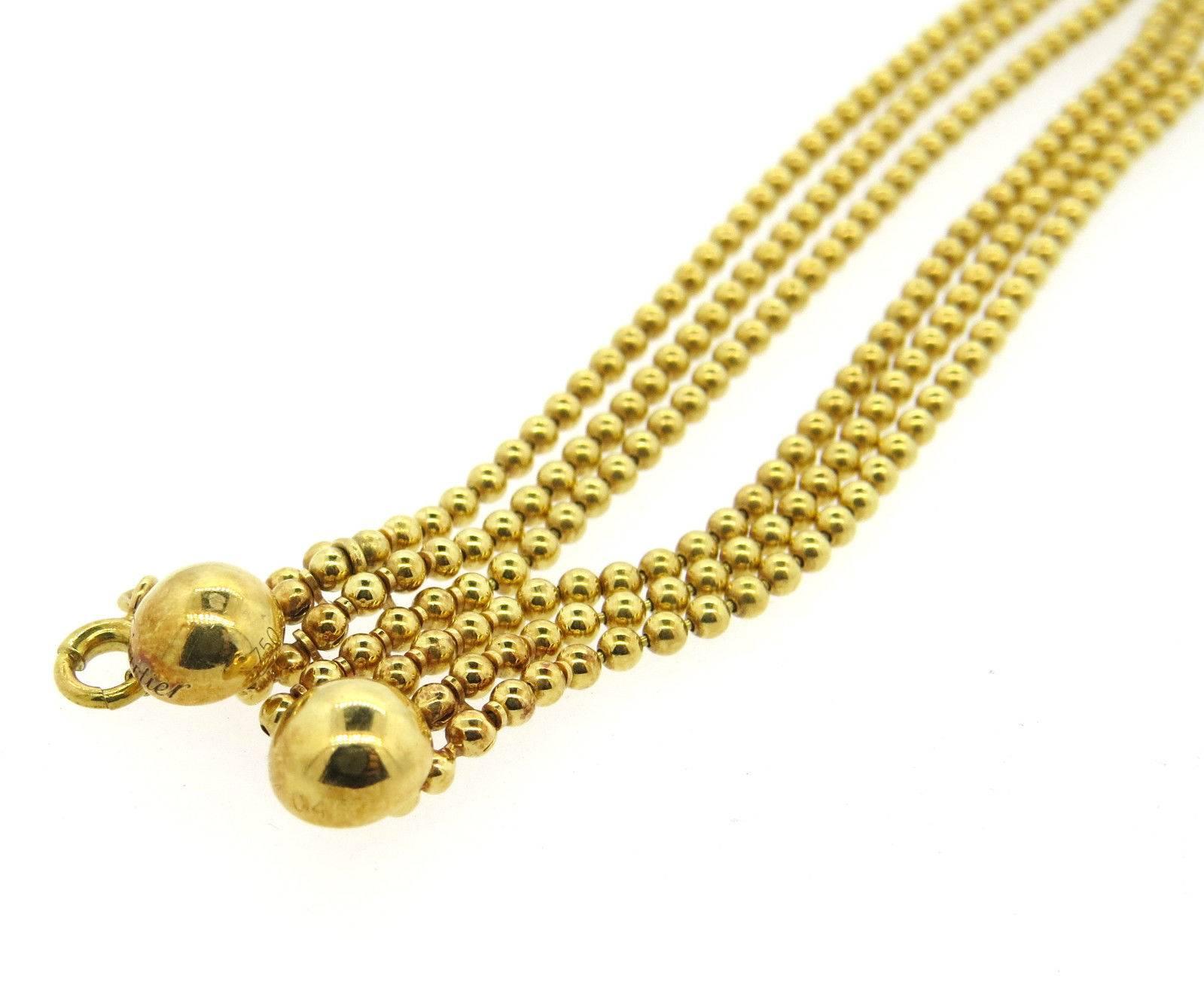 Un bracelet à six rangs en or jaune 18k. Fabriqué par Cartier pour la collection Draperie de Decolette, le bracelet mesure 7