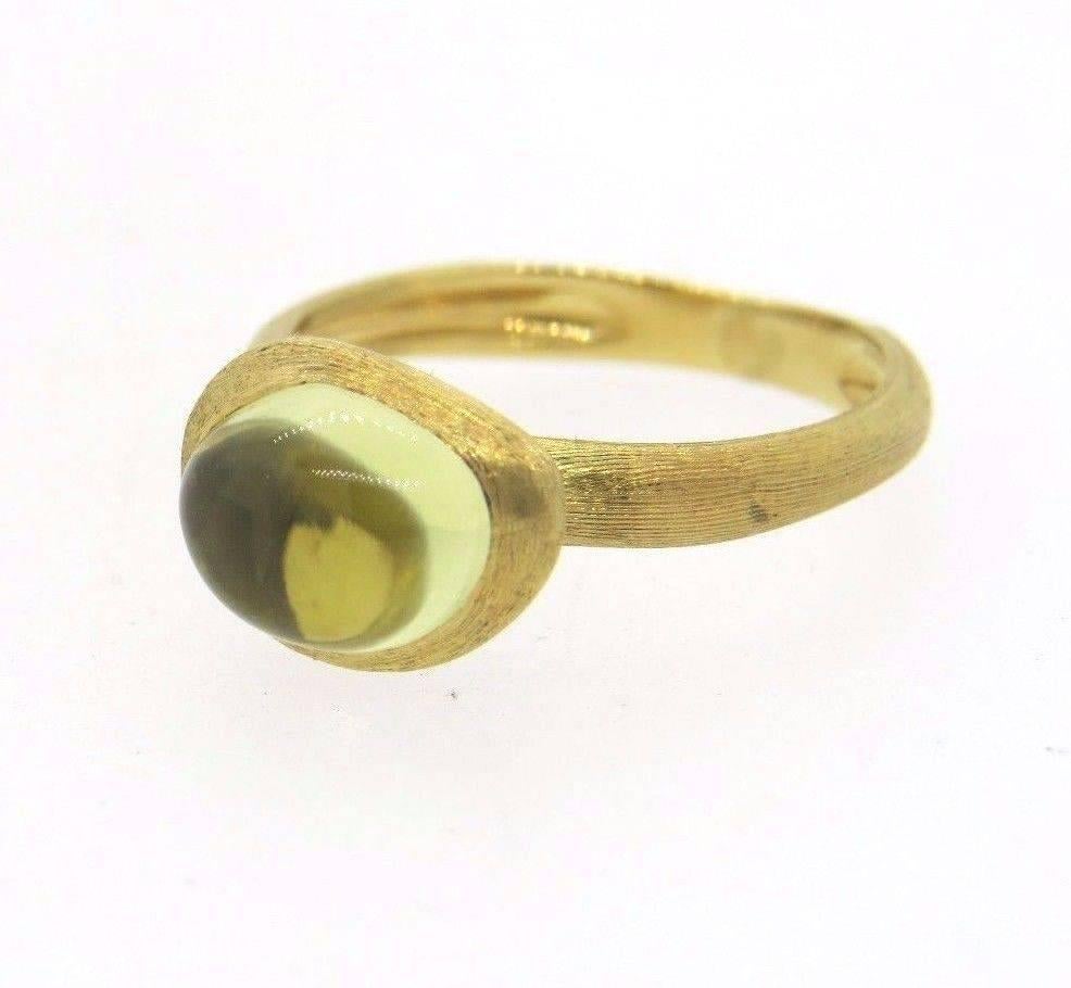 18k yellow gold ring, crafted by Marco Bicego for Confetti collection, featuring peridot in the center. Ring is a size 5 3/4. Marked 750, made in Italy and Marco Bicego. Weight of the piece - 4.2 grams 
Retail $1140