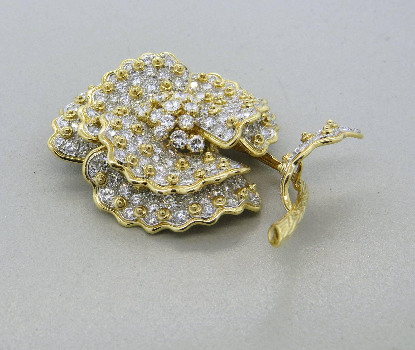 An 18k yellow gold brooch set with 15.25ctw of FG/VS diamonds.  The brooch measures 65mm x 49mm, stem can be removed - see photos.  The weight of the piece is 50.3 grams.