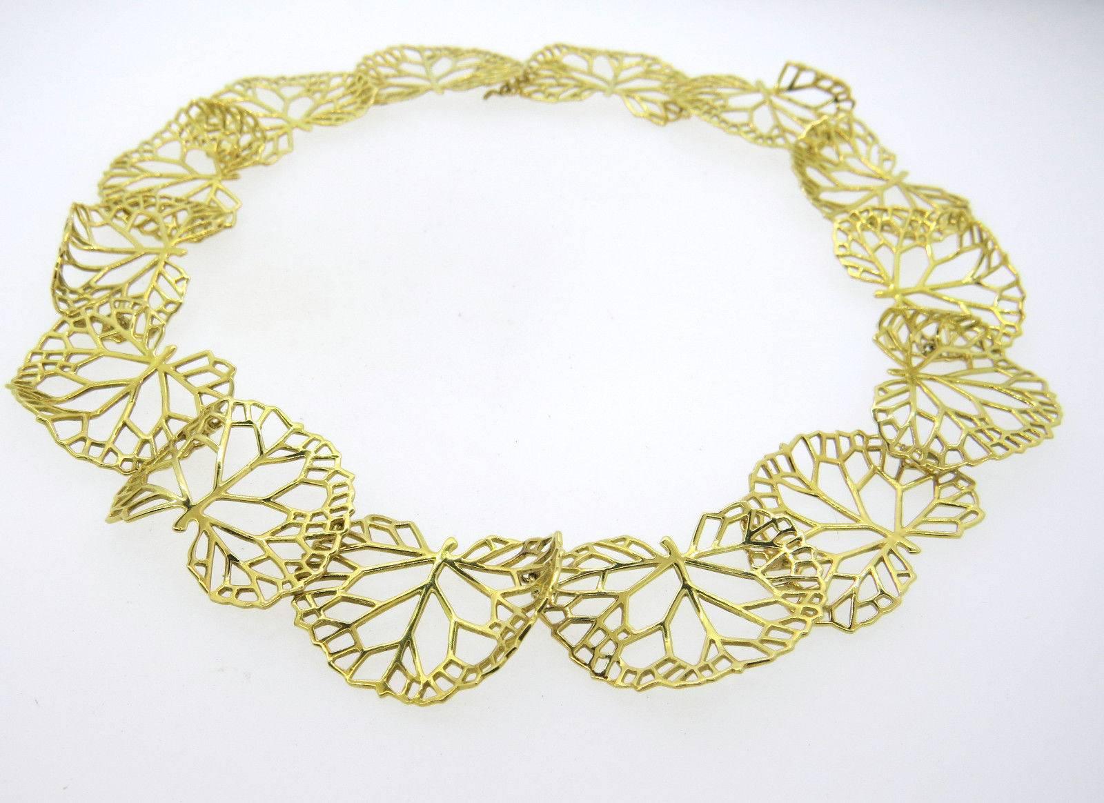 An 18k yellow gold necklace in a leaf motif.  Crafted by Angela Cummings, the necklace is 17