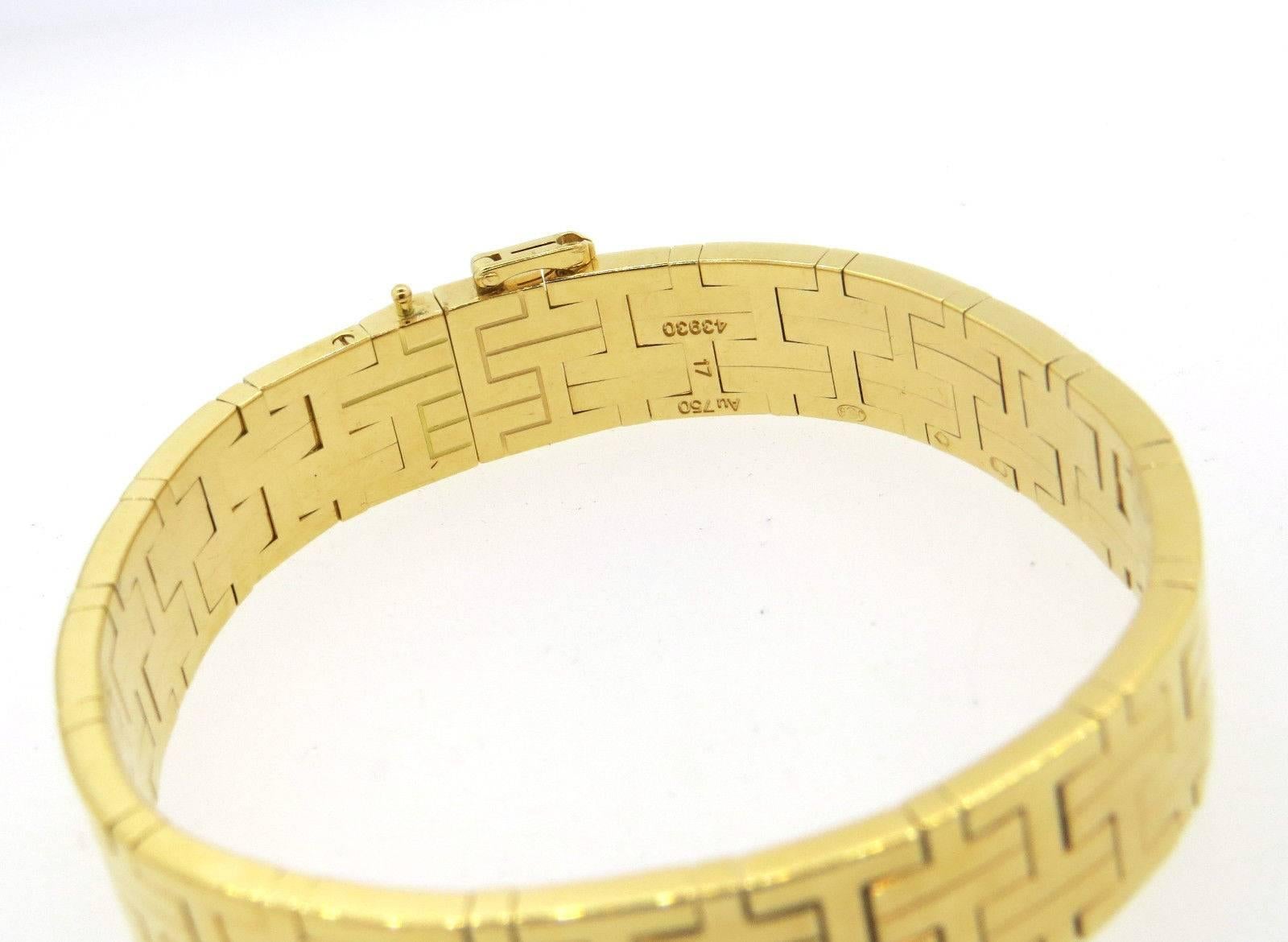 An 18k yellow gold bracelet set in the classic H pattern by Hermes.  The bracelet is 6 5/8