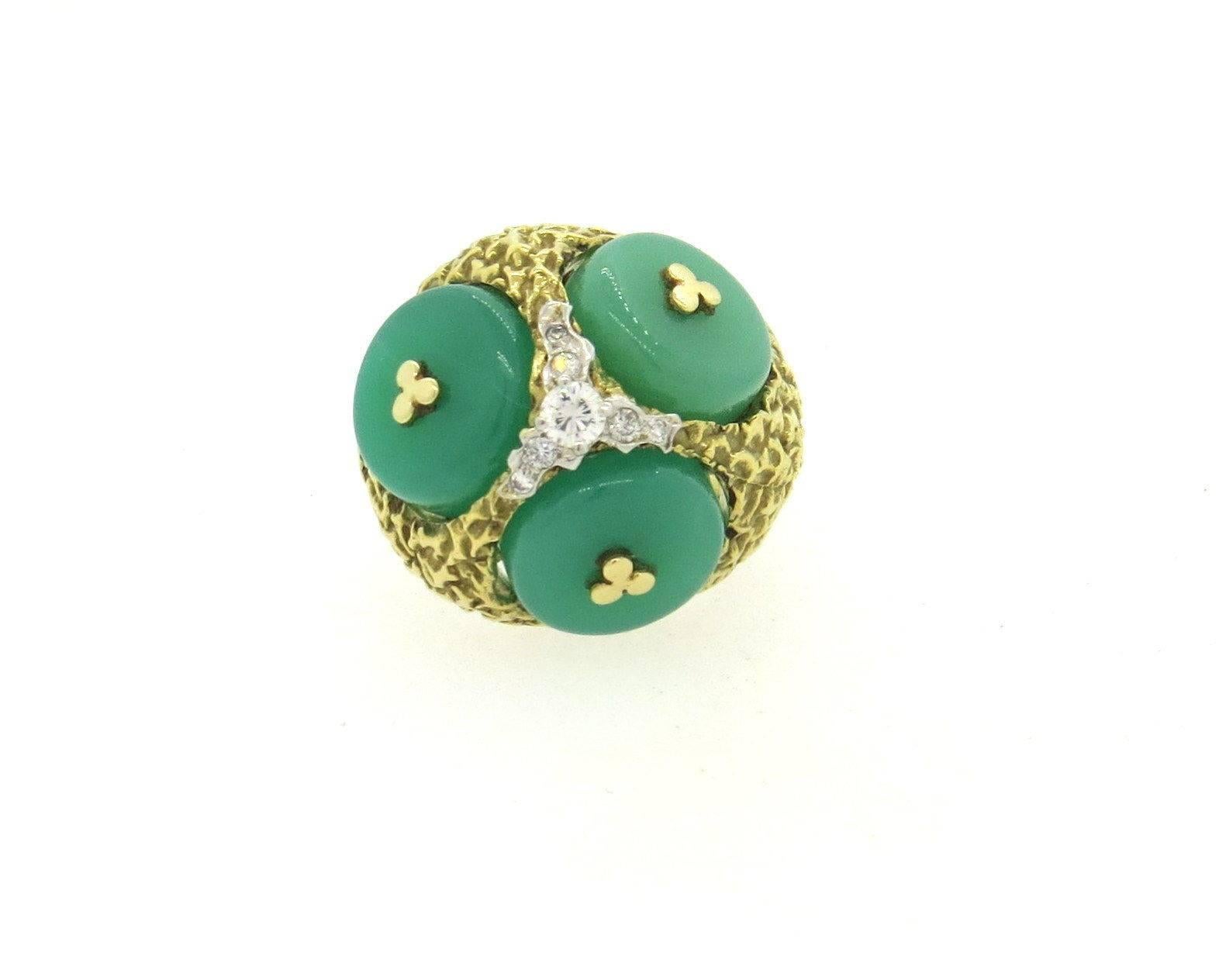 An 18k yellow gold dome ring set with chrysoprase and approximately 0.20ctw of H/VS diamonds.  The ring is a size 6, ring top is 21mm x 24mm, sits approx. 15mm from the finger.  The weight of the ring is 22.1 grams.  Not marked but tested 18k gold.