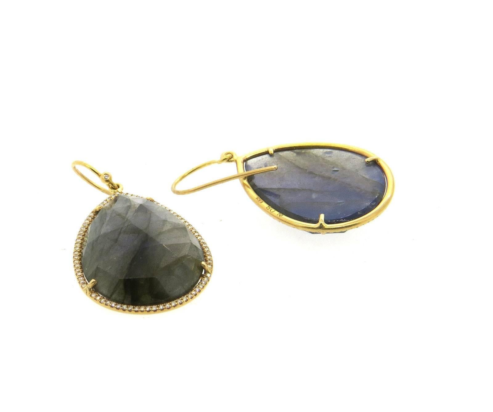 A pair of 18k yellow gold earrings set with labradorite and approximately 1.29ctw of G/VS diamonds.  Crafted by Irene Neuwirth, the earrings measure 43mm long with wires x 24mm wide.  Marked: IN 08 18k.  The weight of the piece is 15.4 grams.