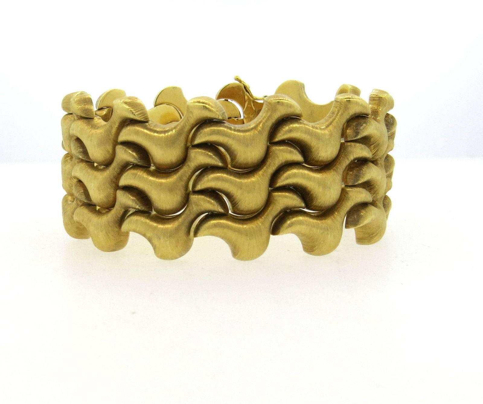 An 18k yellow gold bracelet.  Crafted by Mario Buccellati, the bracelet is 6 7/8