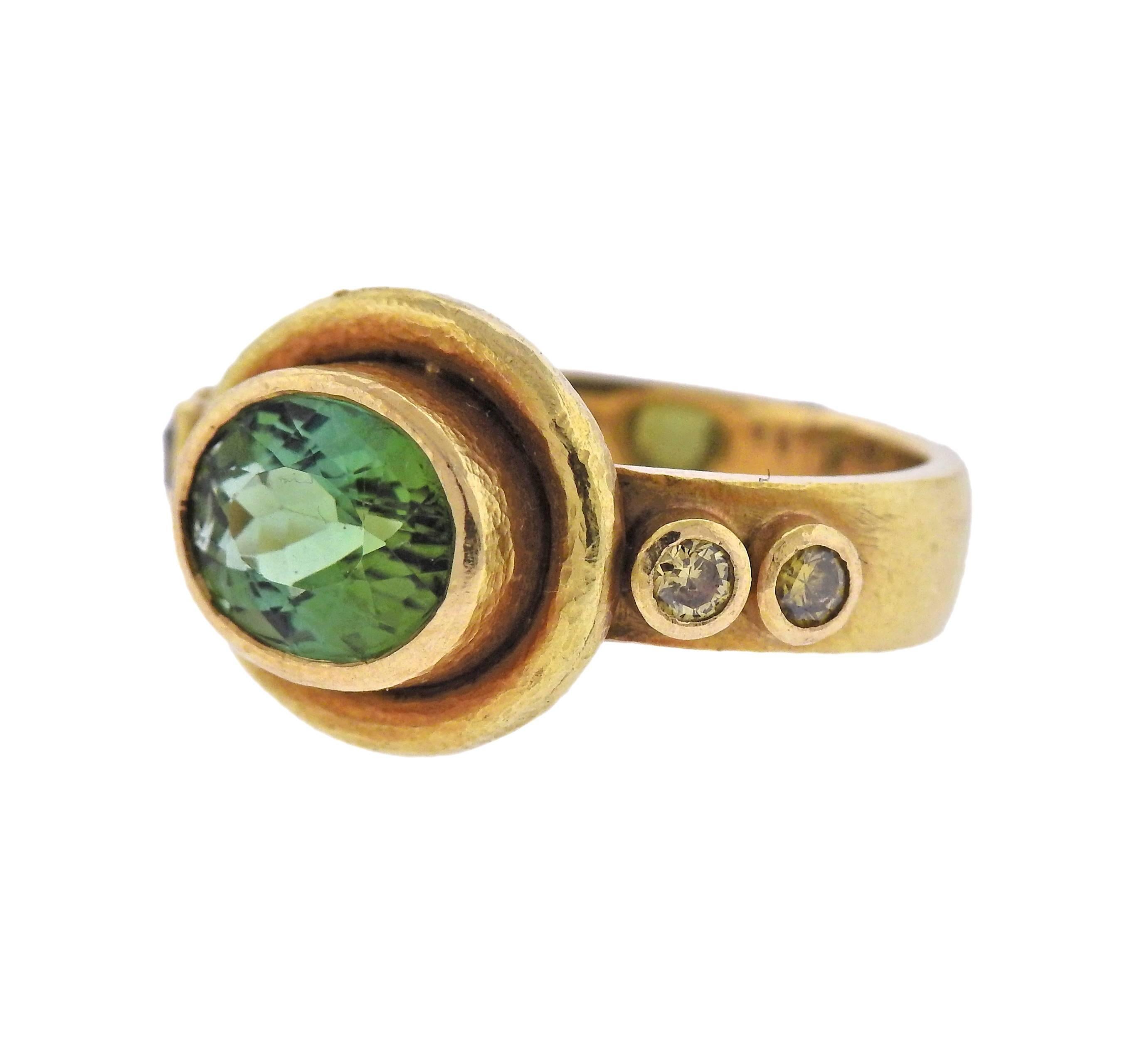 18k yellow gold ring, crafted by Elizabeth Locke, decorated with green beryl, surrounded with fancy diamonds. Ring size - 5 1/2, ring top is 12.5mm x 14mm. marked with Locke mark and 18k. Weight - 8.2 grams  