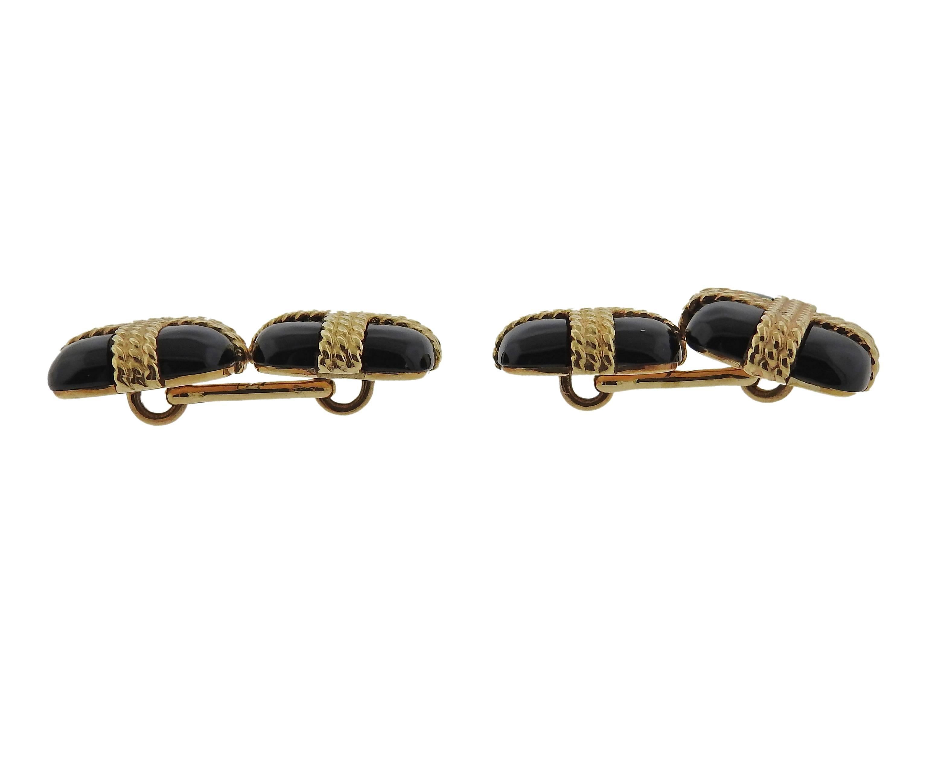 Pair of 14k yellow gold cufflinks, decorated with onyx. Cufflink top is 15mm x 15mm , weight - 17.9 grams. Marked:14k