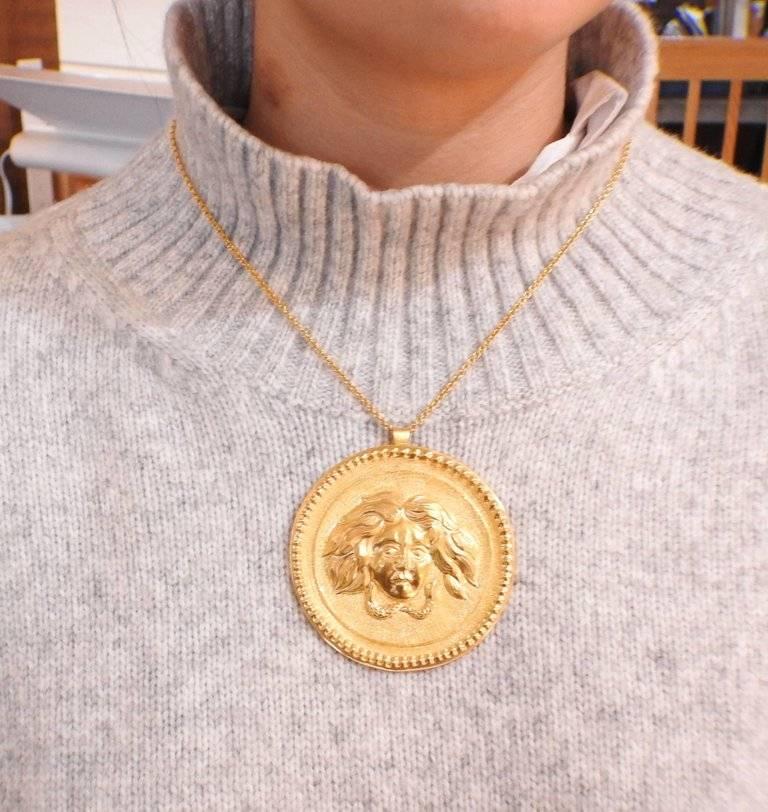 big gold medallion pendant