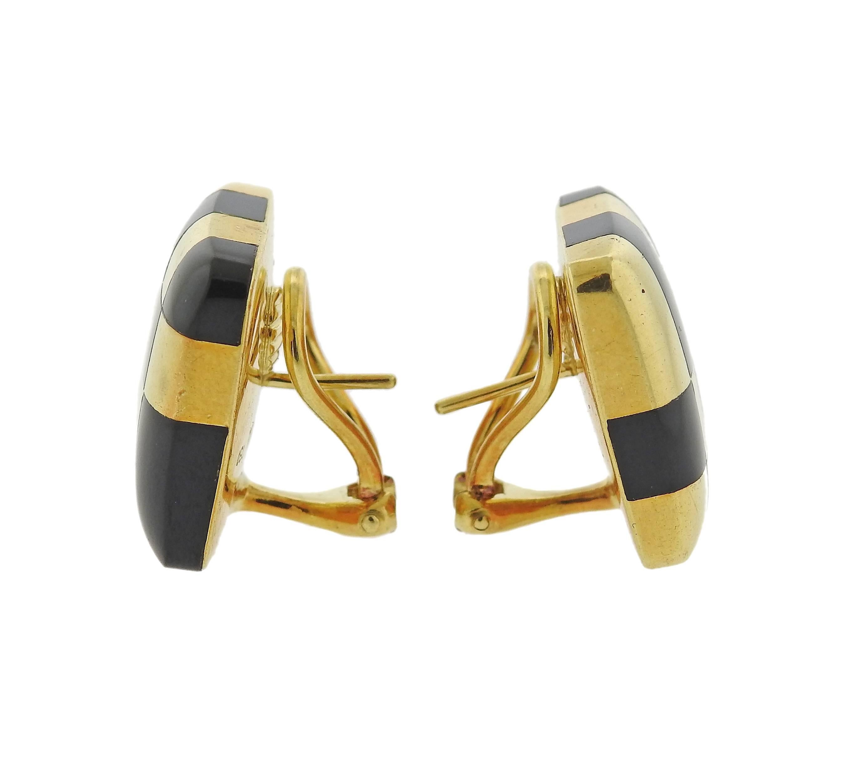 Pair of classic 18k yellow gold earrings, crafted by Tiffany & Co, set with black jade inlay.  Earrings are 20mm x 20mm.  Marked; T & Co, 750, 1982. Weight: 17.5 grams. 