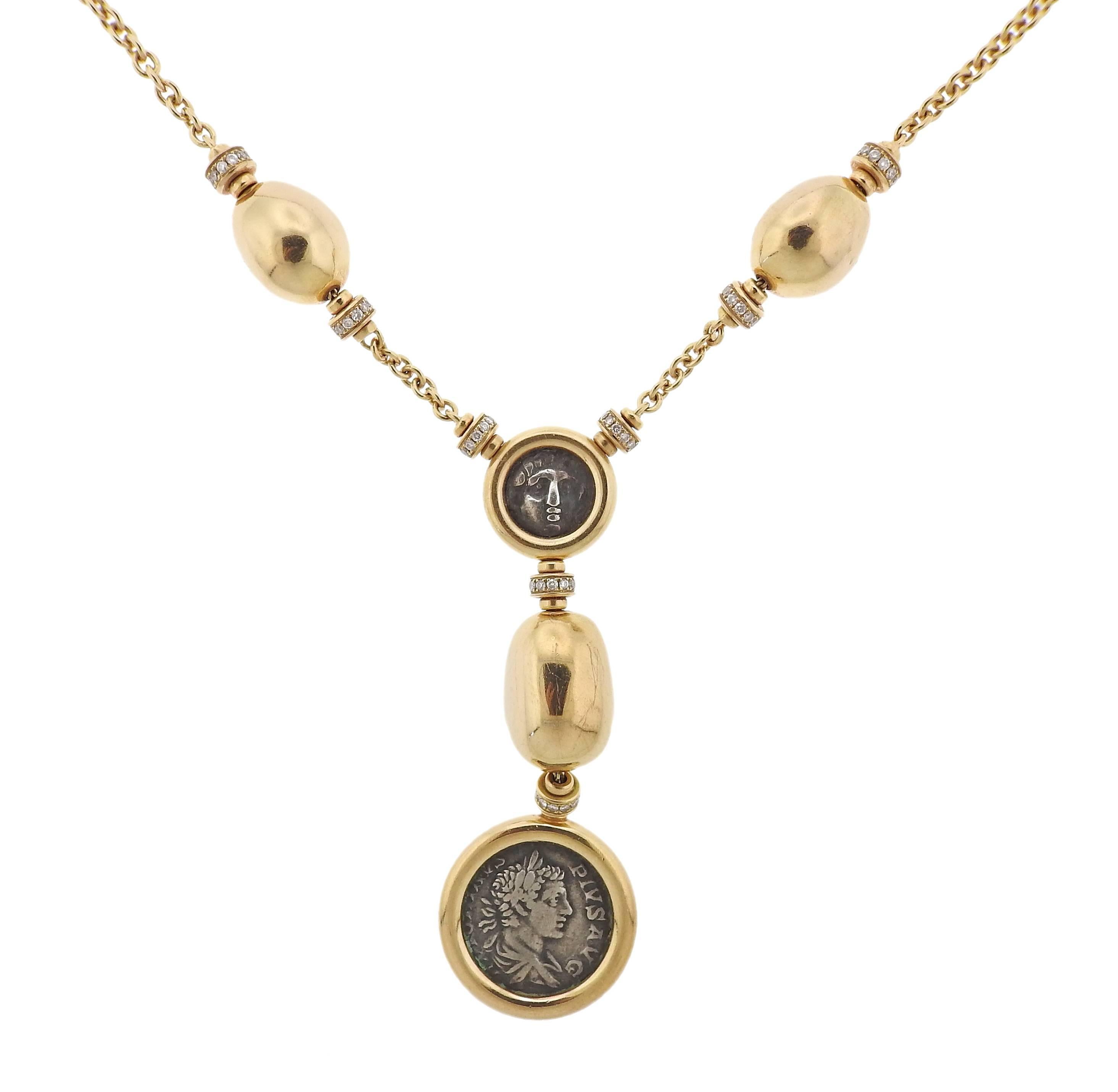 An 18k yellow gold pendant necklace, crafted by Bulgari for Monete collection, featuring ancient coins and  diamonds.  Necklace is 17 3/4