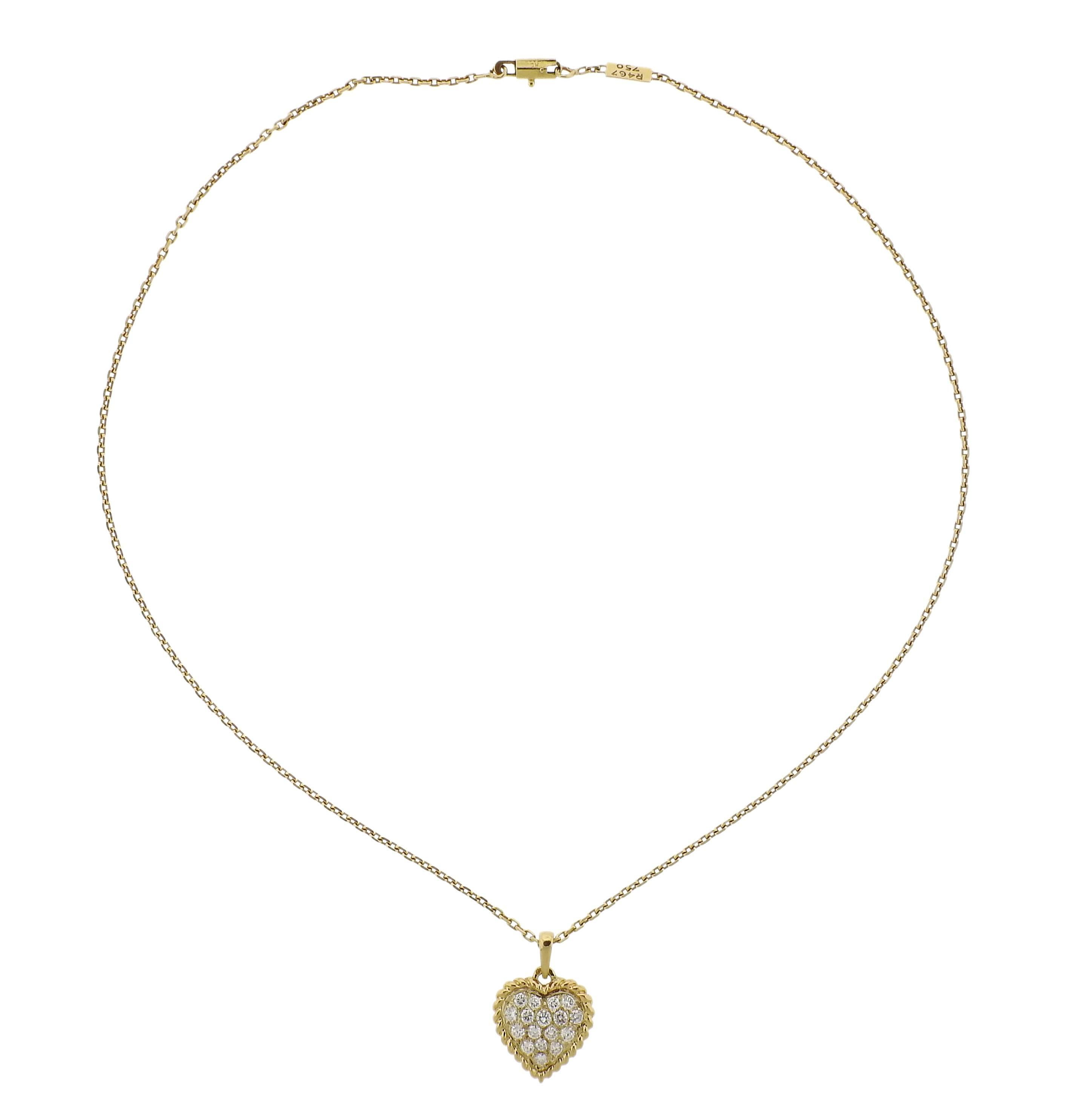 Delicate 18k yellow gold necklace with heart pendant, decorated with approximately 0.75ctw in diamonds. Necklace is 18 1/4