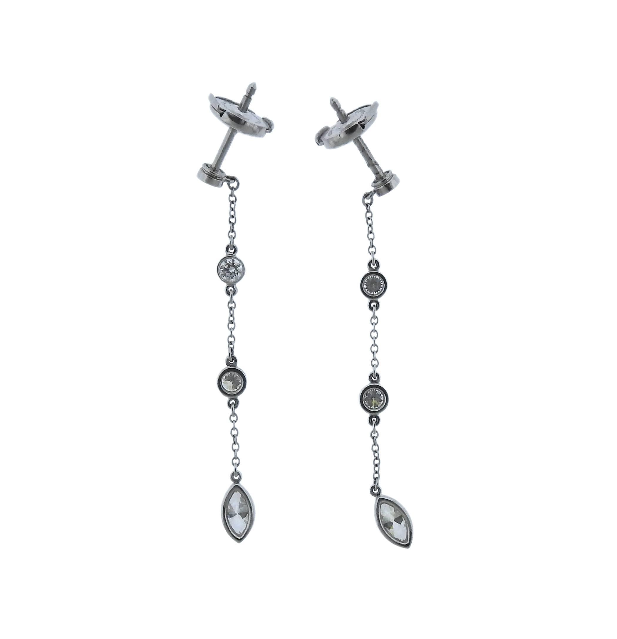 Tiffany & Co. platinum and diamond earrings from the Jazz collection. Earrings are decorated with approximately 0.81ctw of diamonds. Retail for $5,400. Weight: 4.0g