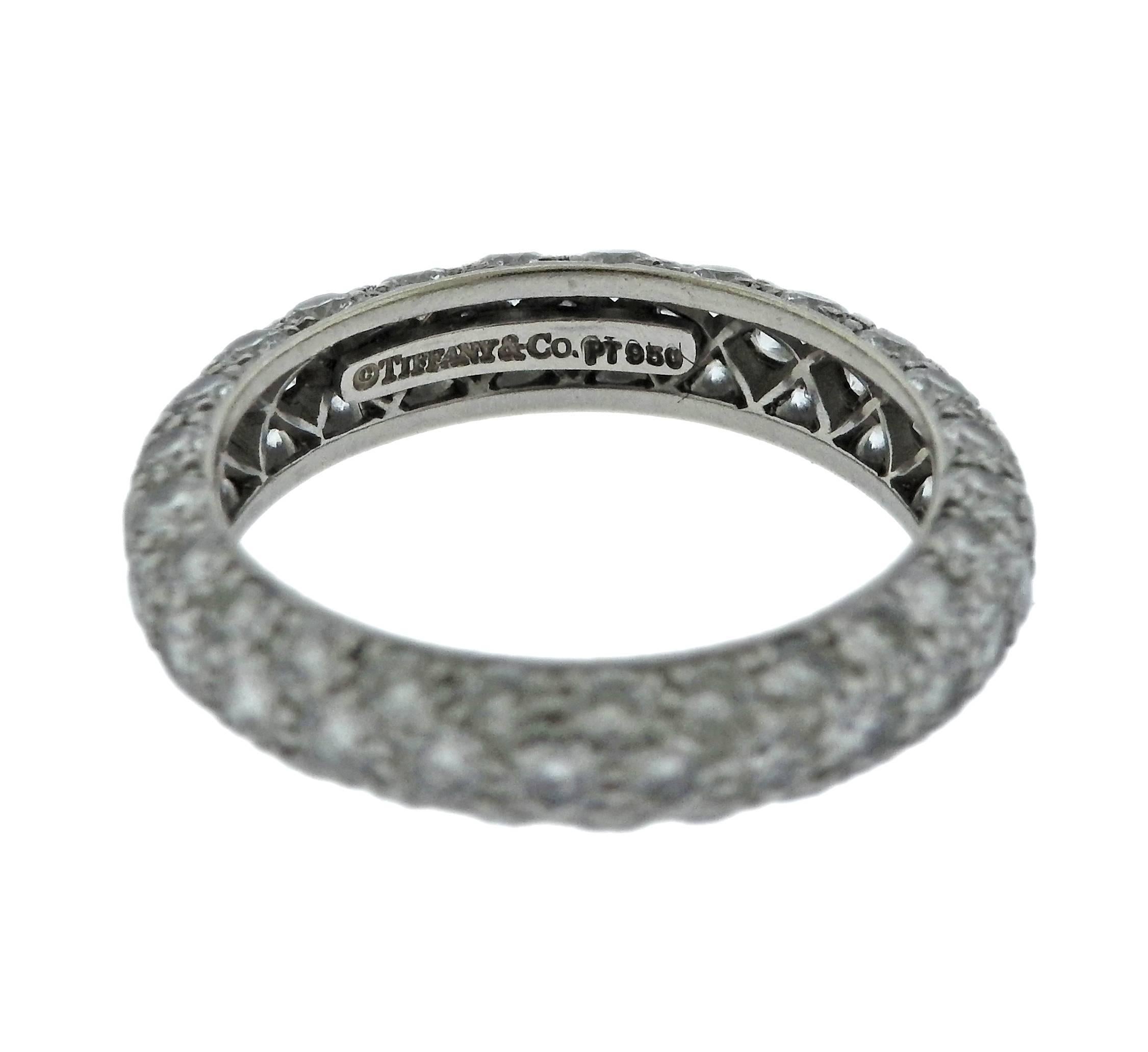 Platinum 1.80ctw G/VS wedding band ring crafted by Tiffany & Co for the Etoile collection. Ring size - 4 1/2, ring is 3.6mm wide and weighs 2.8 grams. Marked Tiffany & Co, pt950.