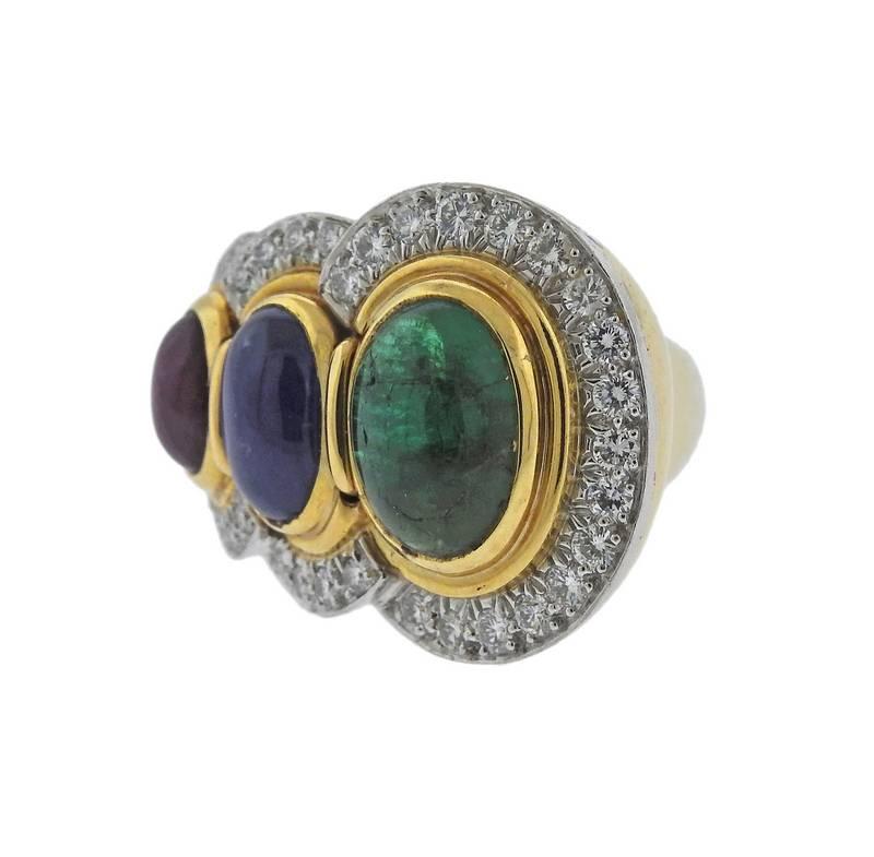 Large and impressive David Webb ring,  crafted in 18k gold and platinum, set with approx. 0.90ctw in diamonds, as well as ruby, sapphire and emerald cabochons. Emerald has natural external imperfections. Ring size - 7 1/2, ring top is 22mm x 31mm,