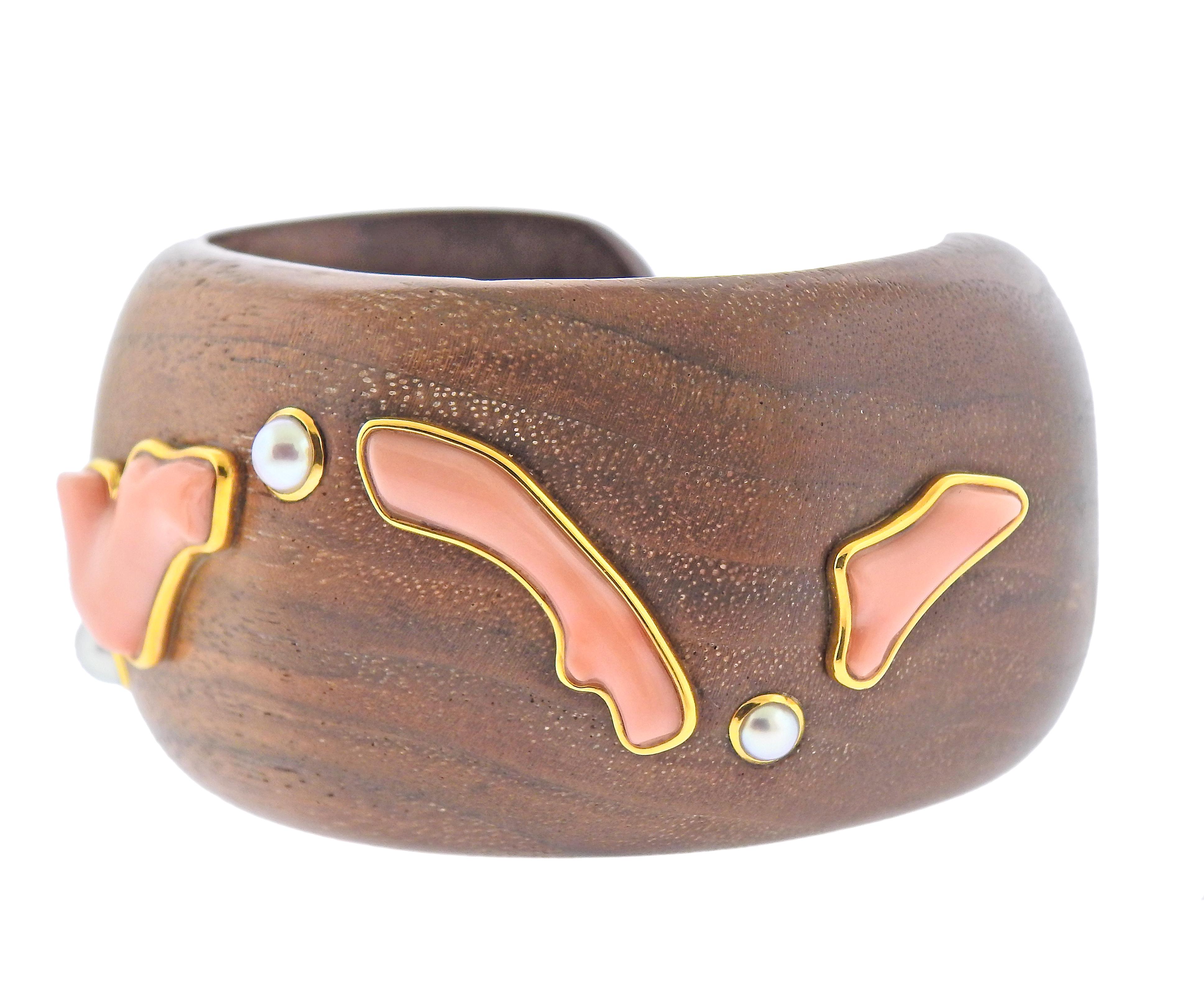 Estate Trianon 18K Gold Coral Pearl Wood Cuff Bracelet!! Retail 7720!! 4 pearls, ranging from 6.6mm to 3.9mm in diameter, 4 coral , bracelet 39mm wide, inner measurements 56mm X 45mm, opening 29mm, (1 inch= 25mm), Marked: 750 Makers Mark,