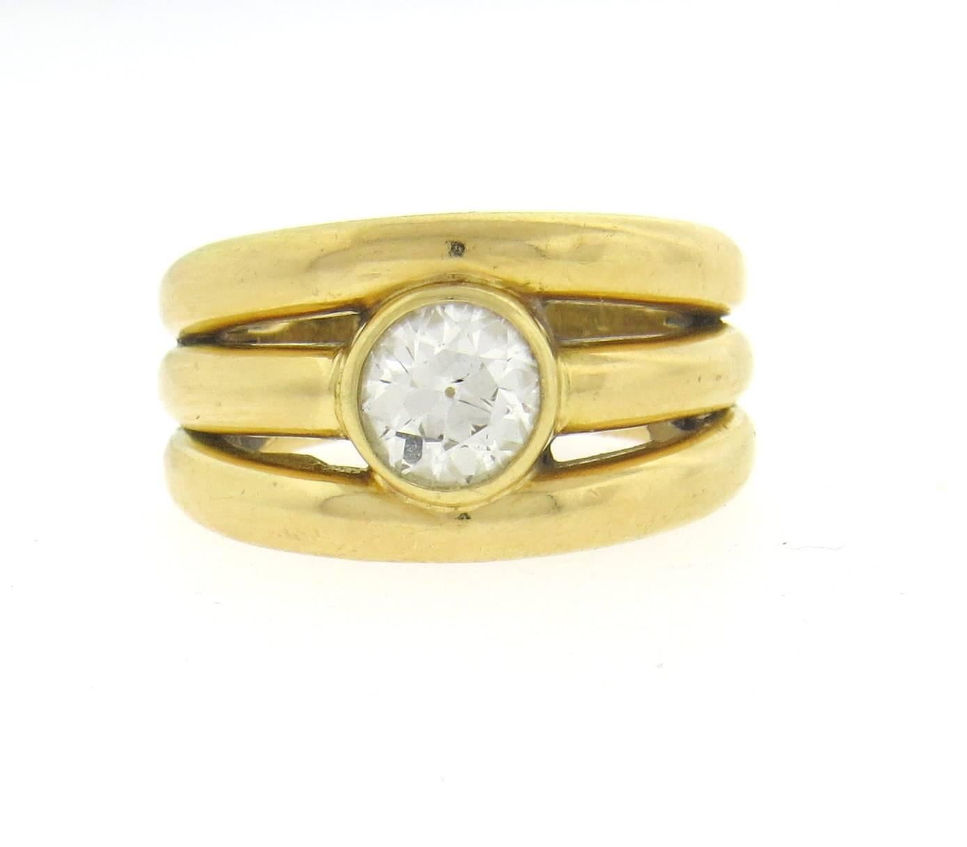 An 18k yellow gold ring set with a old European cut H/SI diamond weighing approximately 1.54ct . by formula , Crafted by Chaumet, the ring is 13.4mm wide and is a size 8.  The weight of the piece is 16.6 grams.