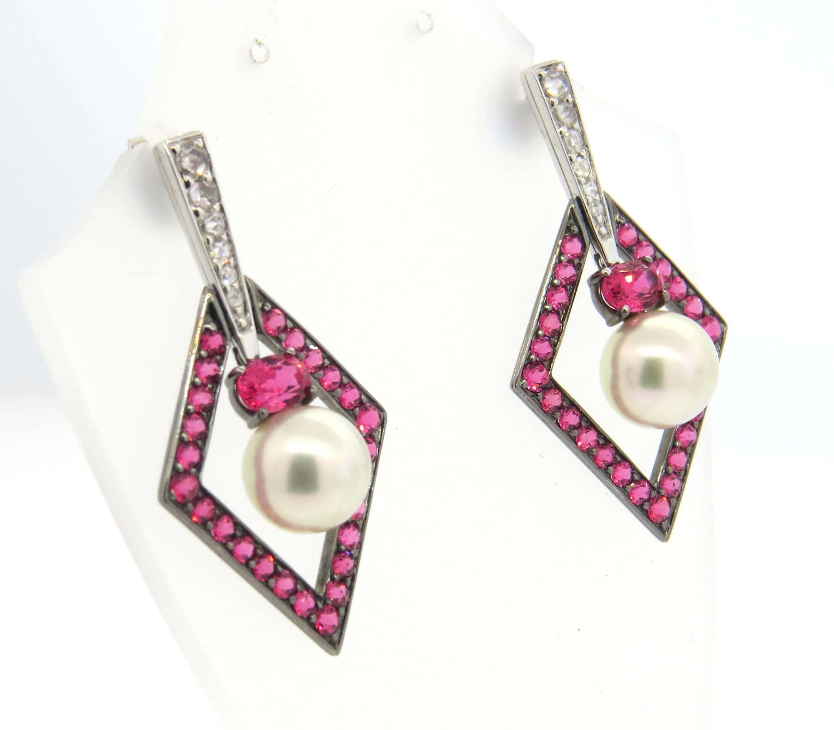 18k white gold long earrings, crafted by John Hardy for Cinta collection, decorated with rose cut diamonds, 10.3mm pearls and pink spinel gemstones. Earrings are 44mm x 24mm. Marked 18k JH. Weight - 14.7 grams