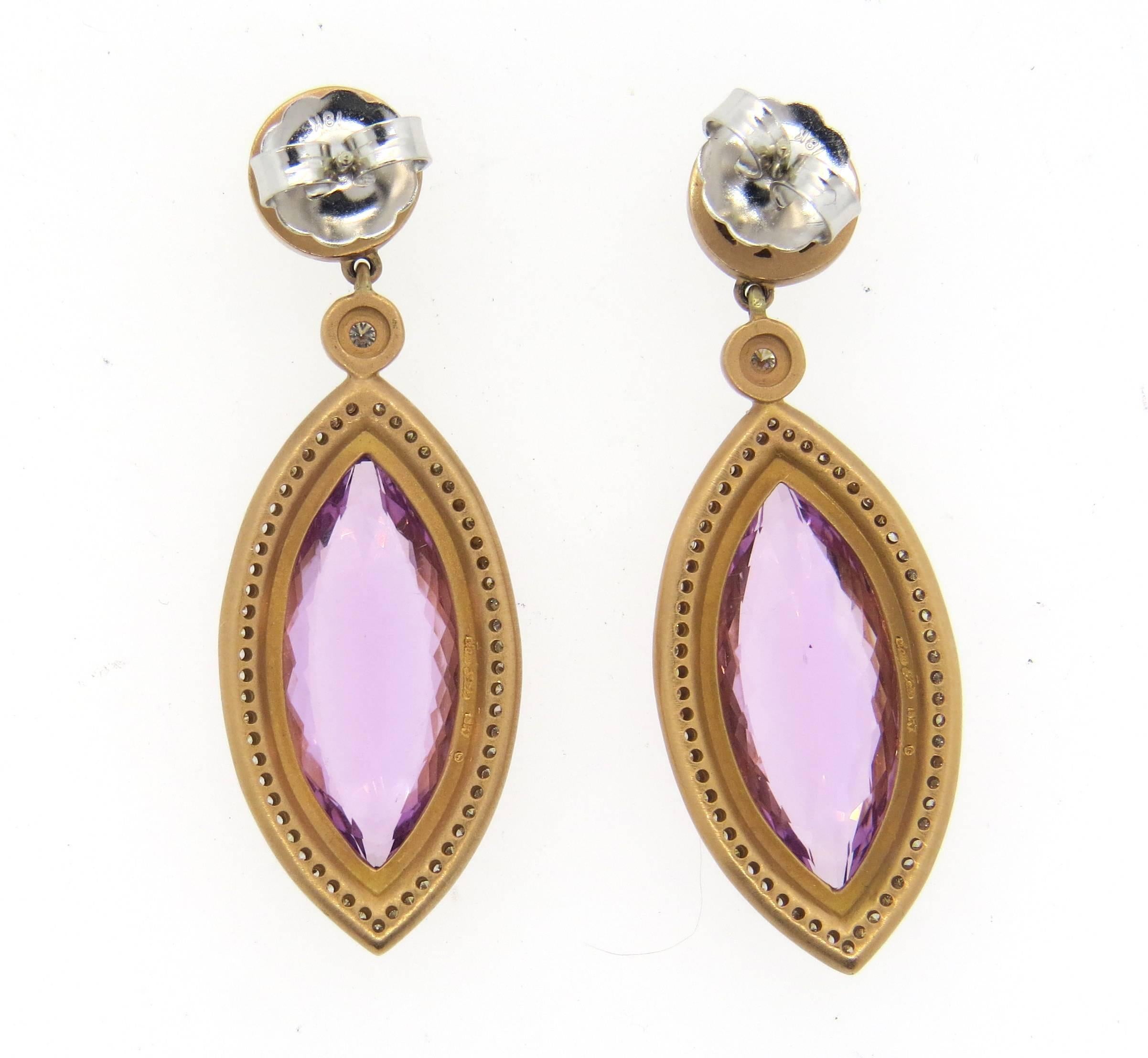 18k rose gold drop earrings, crafted by Sam Lehr, decorated with 25mm x 10mm  x 6.8mm kunzite gemstones, surrounded with approximately 1.20ctw in G/VS diamonds. Earrings measure 50mm x 17mm. Marked Sam Lehr 18k. Weight - 22.3 grams