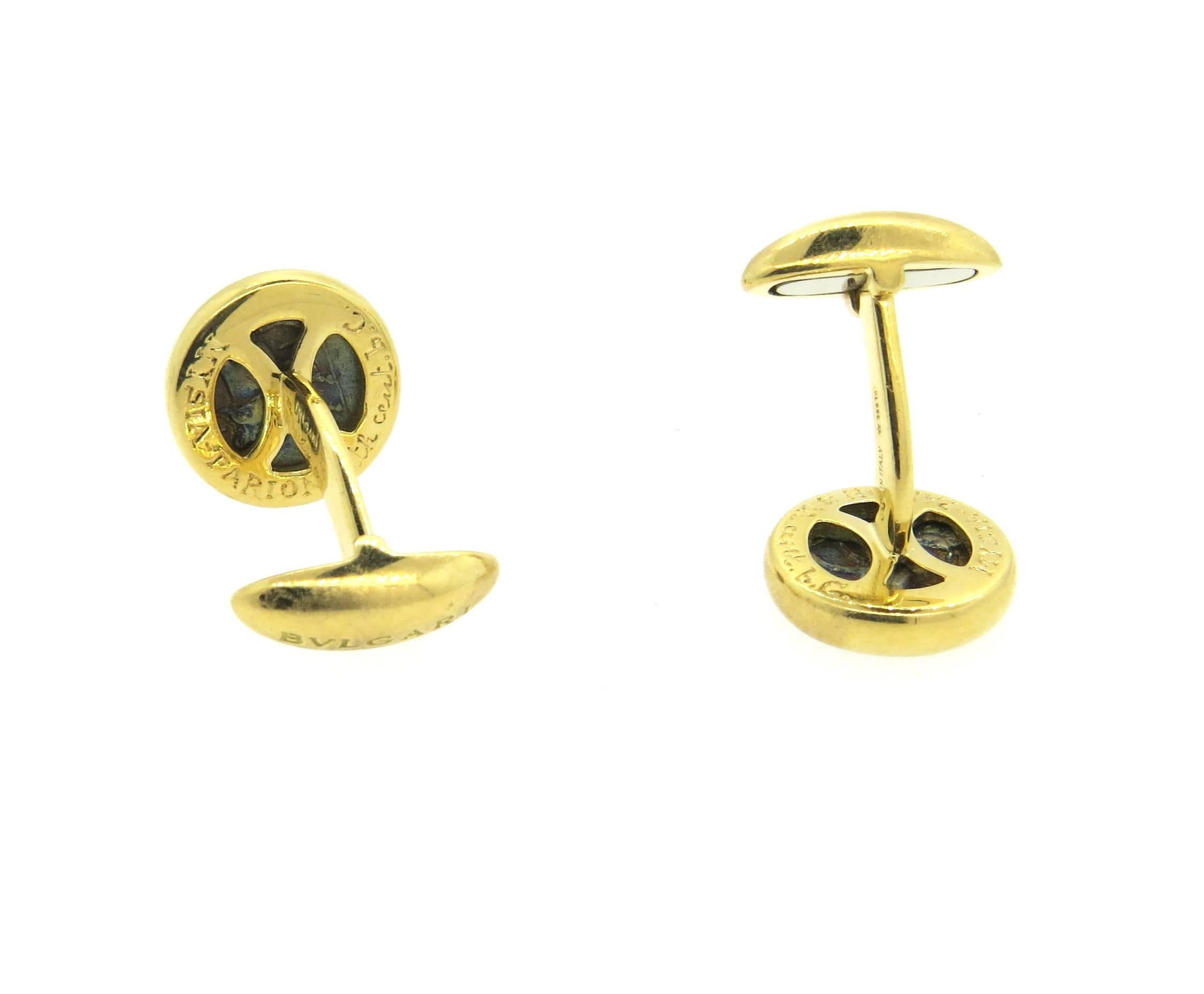 18k yellow gold cufflinks, crafted by Bulgari, set with ancient coins. Top measures 15mm in diameter. Marked Bvlgari, 750, made in Italy, Mysia- Parion,  4th cent. B.C. Weight - 20.9 grams