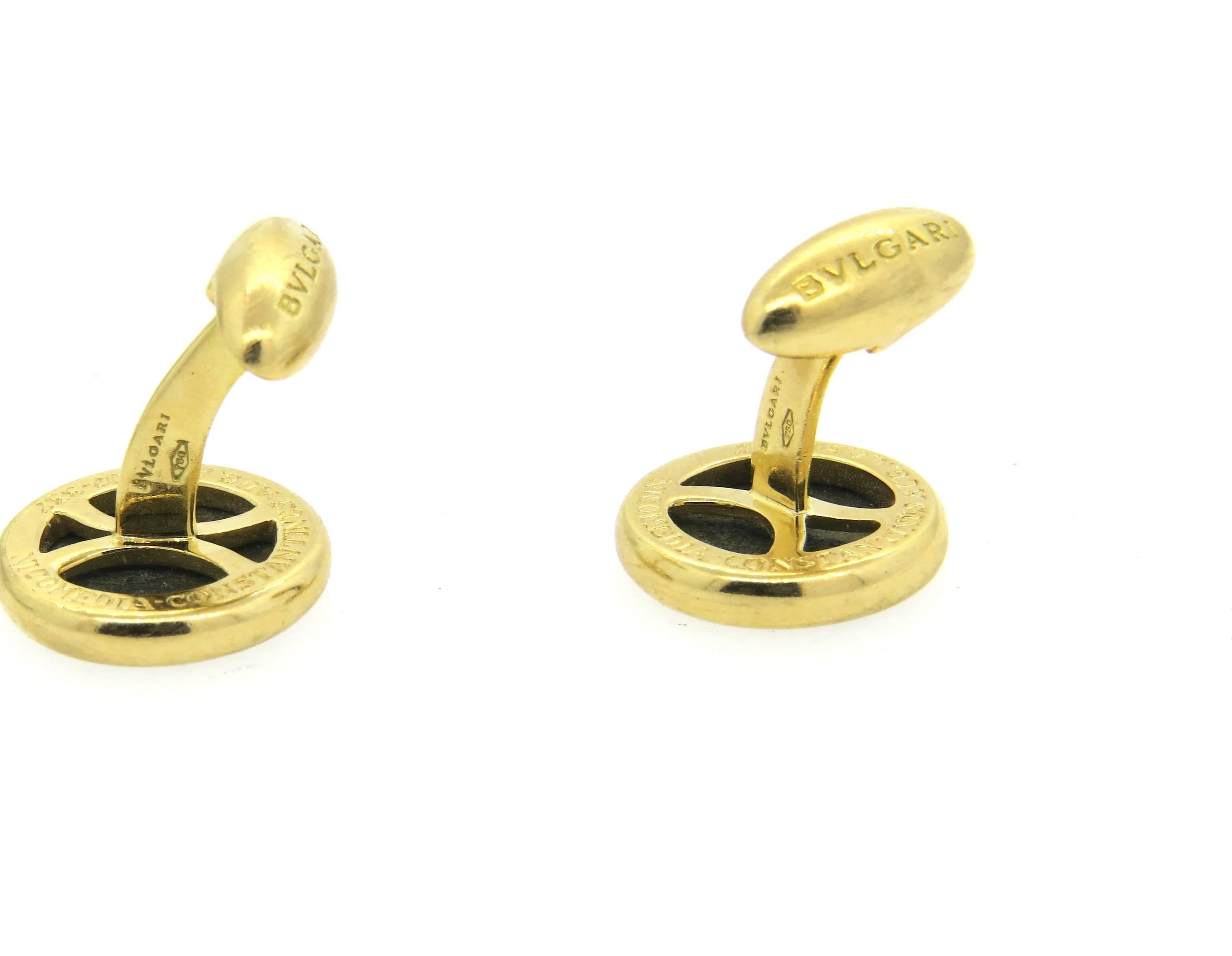 Pair of large 18k yellow gold cufflinks, crafted by Bulgari, set with 15mm ancient coins. Cufflink top measures 19mm in diameter. Marked Bvlgari, made in Italy,750, Nicomedia-Constantinus, Aug. A.D.307-337. Weight - 23.7 grams