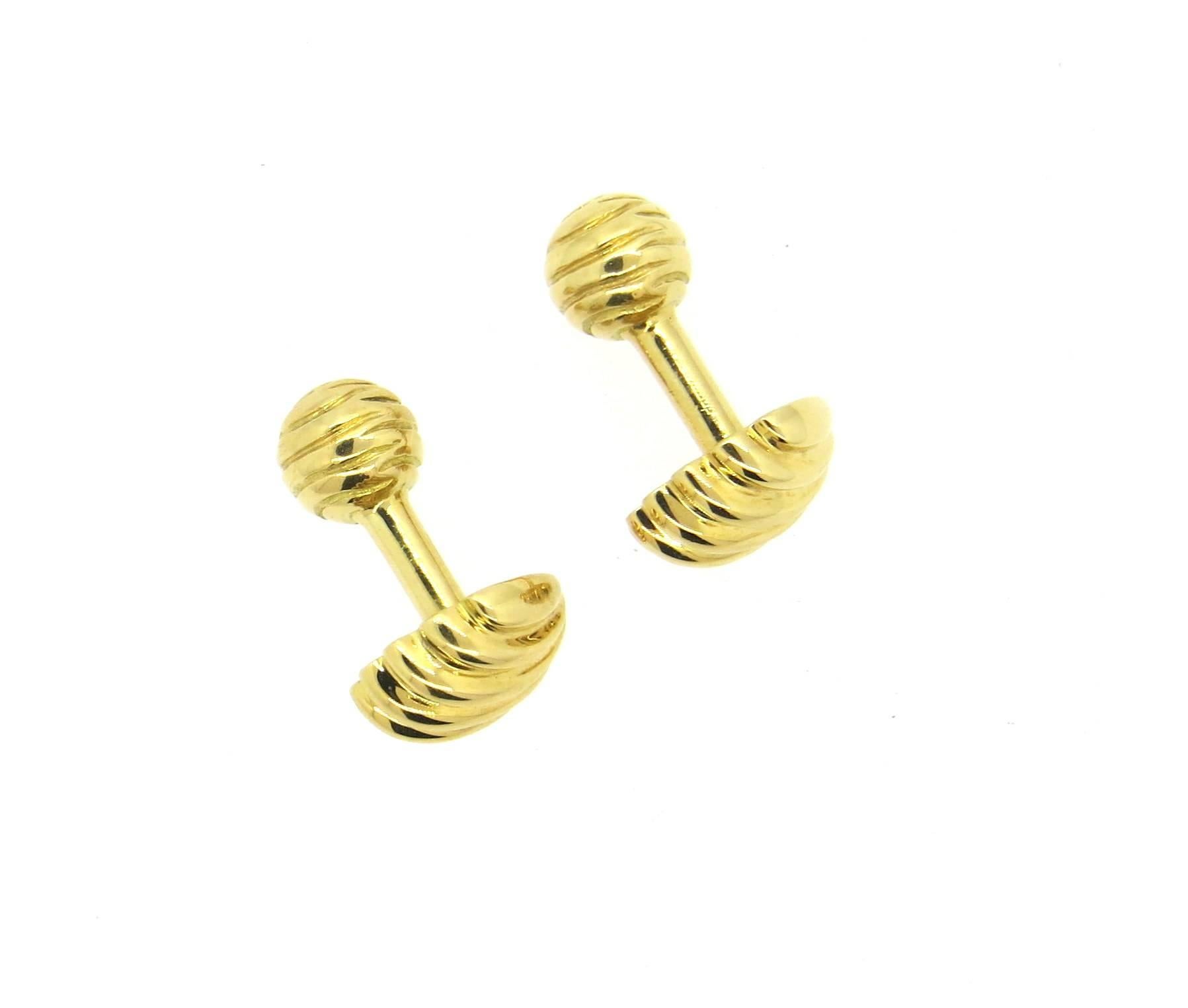 Large 18k yellow gold cufflinks, crafted by Tiffany & Co, featuring shell motif top. Cufflink top measures 16mm x 15mm, back - 10mm in diameter. Marked Tiffany & Co, Italy, 750. Weight - 28.8 grams
