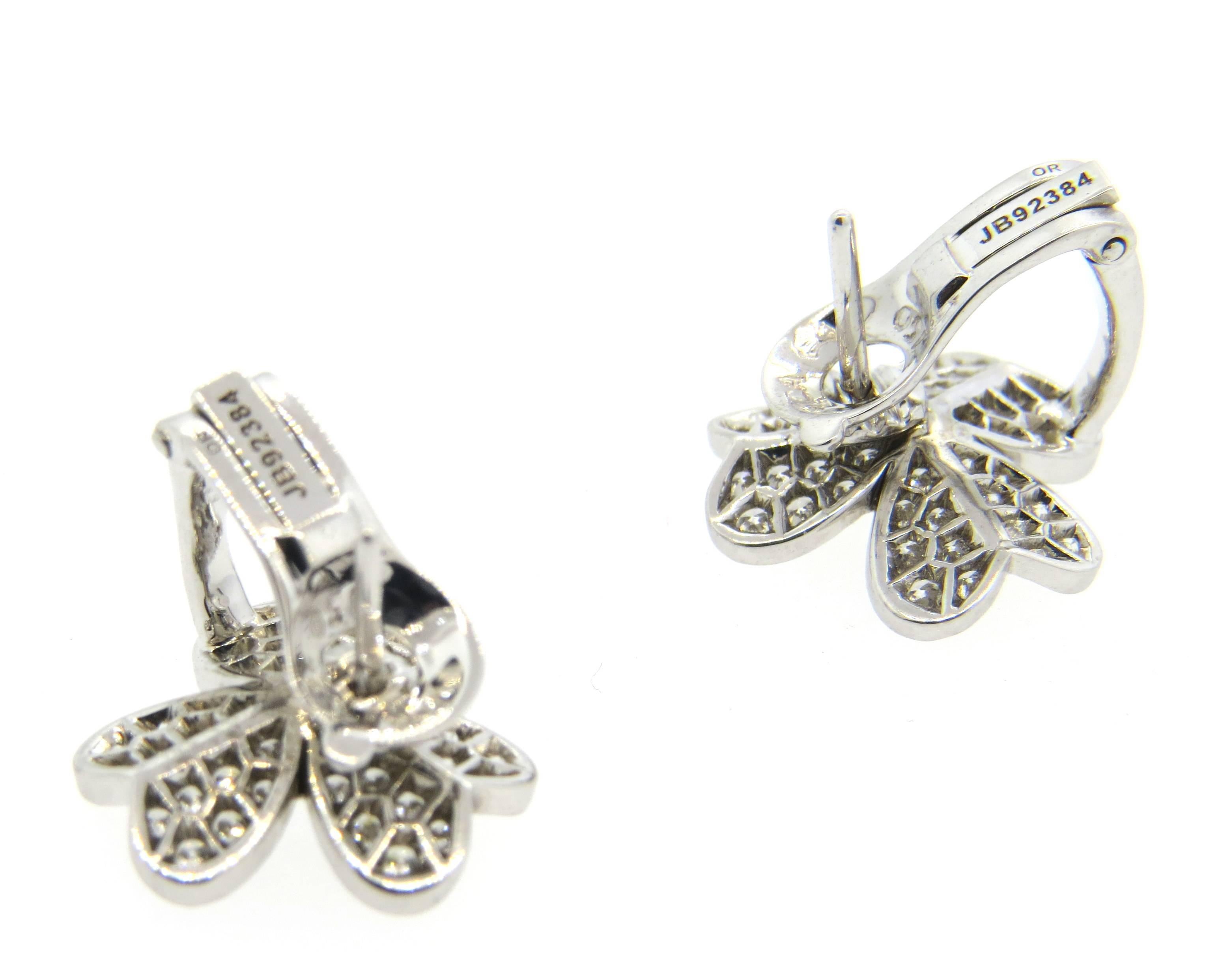 Gorgeous 18k white gold flower earrings, crafted by Van Cleef & Arpels for delicate Frivole collection,  set with 1.61ctw in VVS/FG diamonds. Earrings measure 15mm x 14mm. Marked JB 92384, OR VCA, 750. Weight - 6.7 grams
Current retail $16900
Come