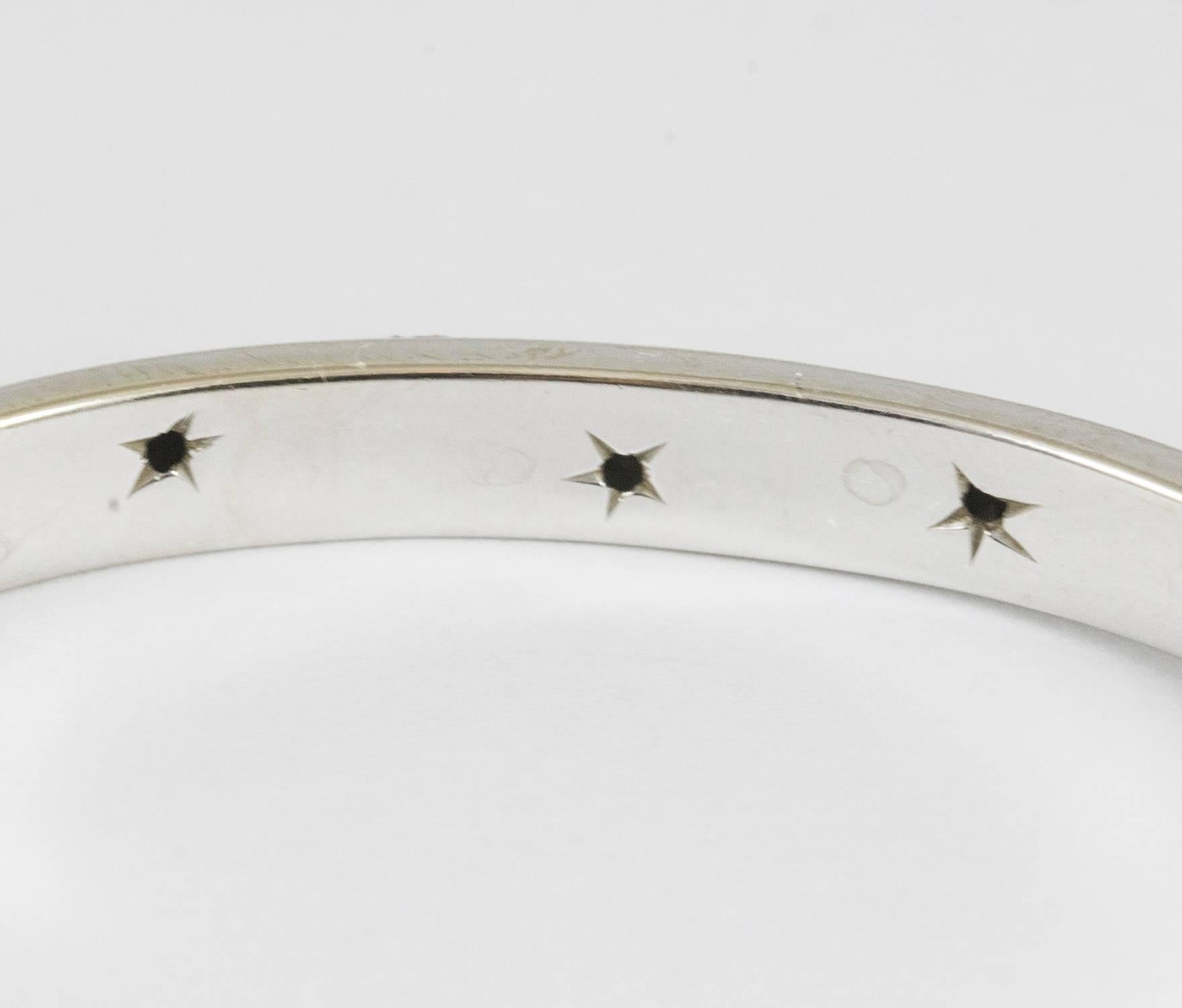 A high quality 18k diamond set bangle. The bracelet holds 126 round brilliant cut diamonds that are finely bead set (3.78 cts. F-G, SI1-SI2). The cut is excellent-very good. The interior of the bracelet measures 7 inches and it is in excellent
