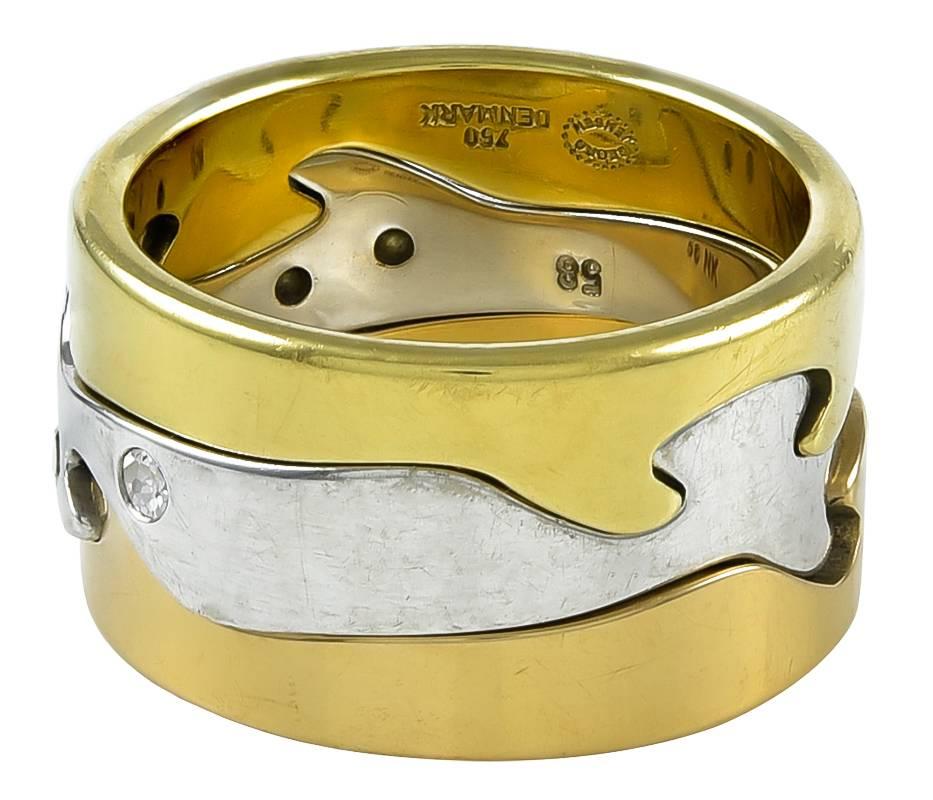 Georg Jensen Gold 'Fusion' Ring with Diamonds. This ring was designed by Nina Koppel (daughter of designer Henning Koppel).  The ring is comprised of three bands: a pink gold band; white gold band set with diamonds and a yellow gold band.  The ring