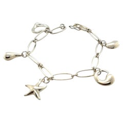 Tiffany & Co. Armband aus Sterlingsilber von Elsa Peretti mit fünf Anhängern, 17,08 g