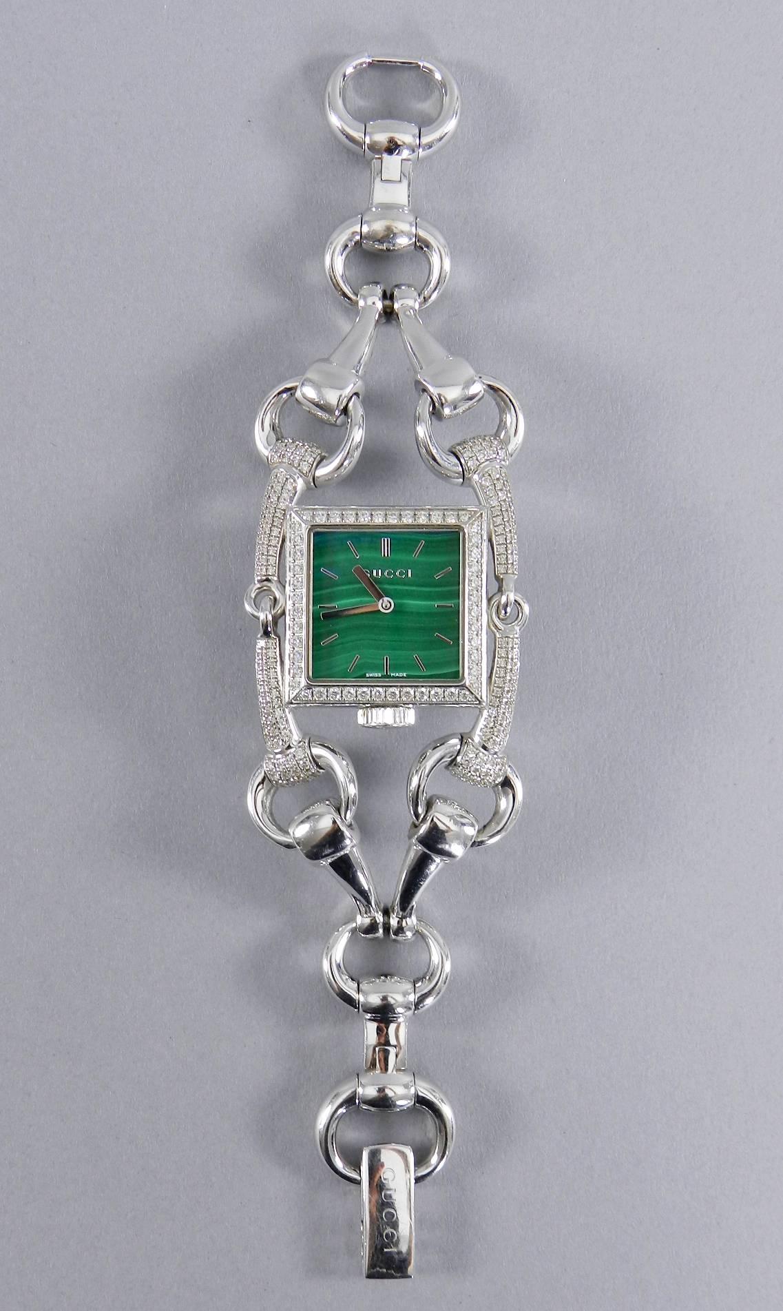 Gucci 18k white gold and diamond Signoria watch with green malachite face. Luxury watch comes with extra links and insurance appraisal. Model number YA116306. Set with 232 diamonds weighing approximately 4.64 carats. Clarity VVS, Color F-G-H. 