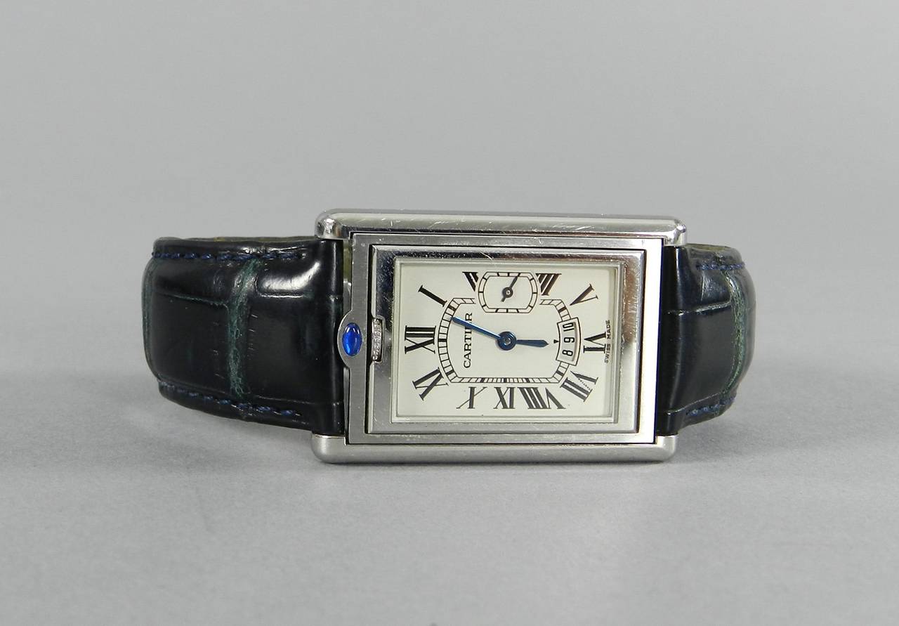 Cartier basculante reverso stainless watch in jumbo large size. With date window, sapphire accent, and additional dial at right. Case measures approximately 1-1/8