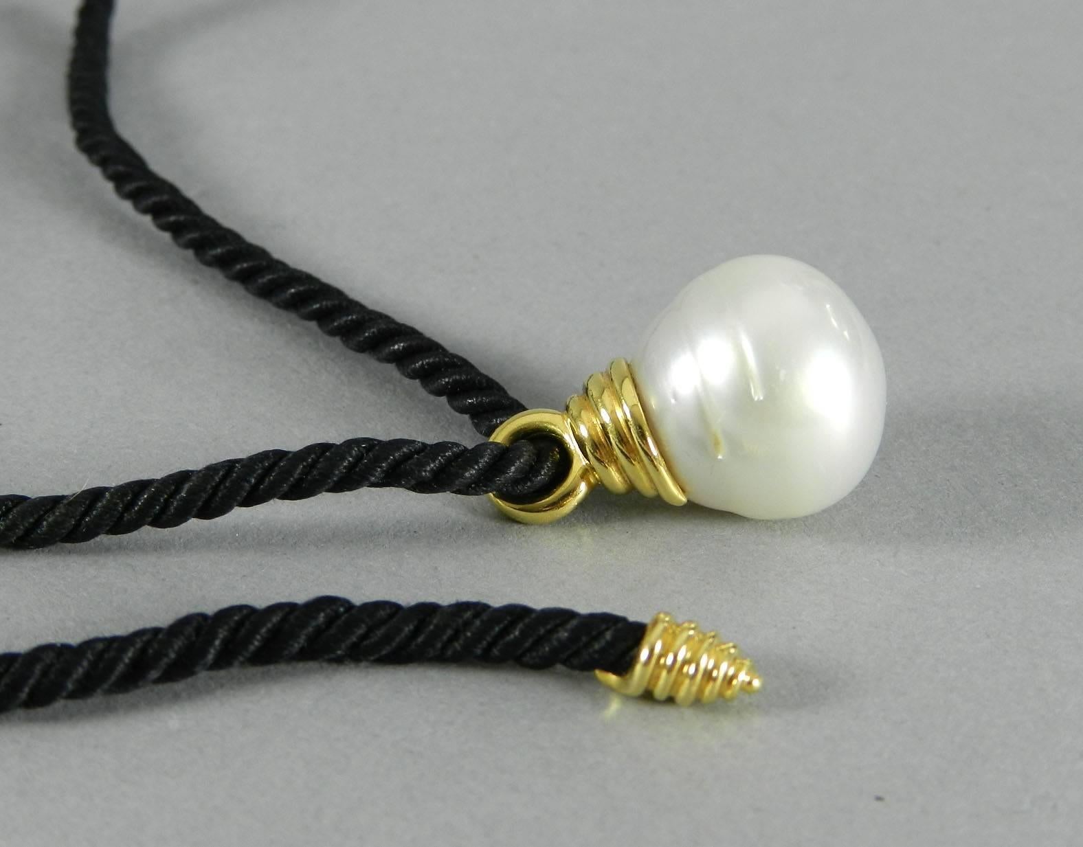 pearl necklace on black cord