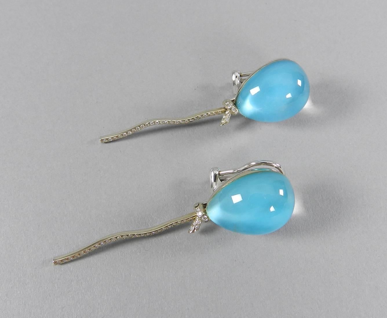Vhernier 18k white gold, diamond, turquoise abalone shell, and rock crystal clip earrings. Measures 2 3/8” x 5/8”. 

We ship worldwide. Canadian residents pay sales tax based on destination province.
