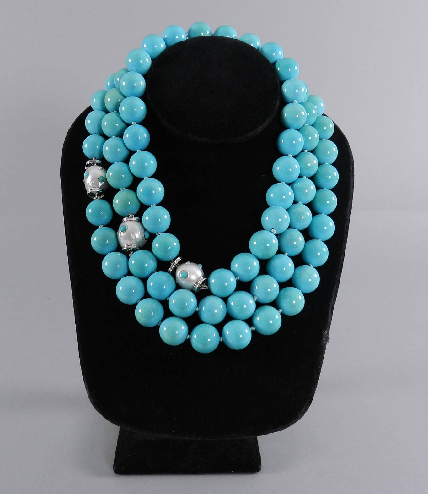 Set of three Trianon turquoise bead necklaces. Baroque pearl clasps are decorated with diamonds, turquoise, and are 18k white gold. Can be worn separately, joined to create one long necklace, or doubled. High quality turquoise beads with a slight