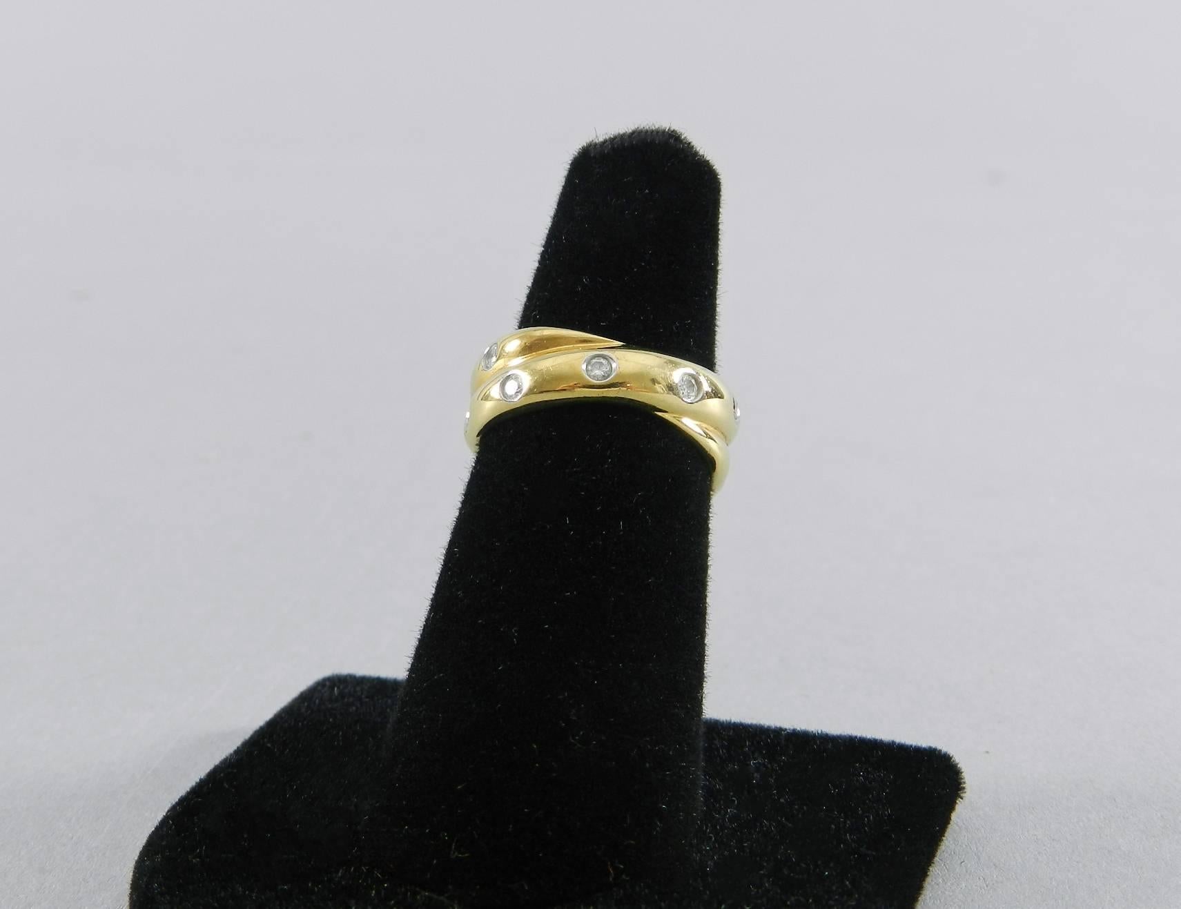 Tiffany & Co. Diamond Gold Platinum Etoile twist band ring In Excellent Condition In Toronto, Ontario