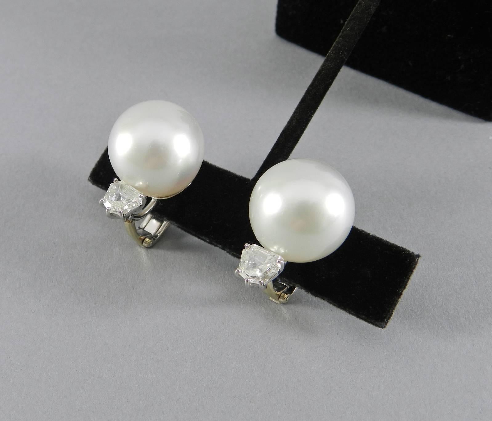 Giovane classic white south sea pearl earrings with fancy cut diamonds in platinum setting.  Pearls have a white background and a silver overtone, with thick nacre and high luster.  The color match is excellent. The pearls measure 17-17.2 mm. 