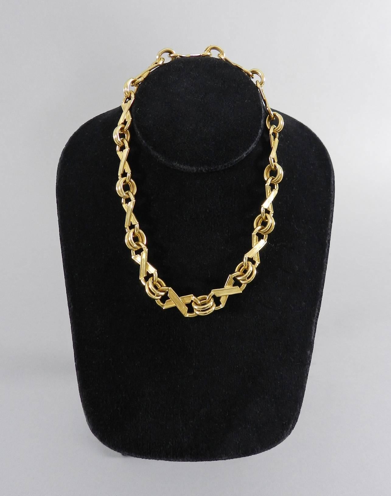 Jean Schlumberger Tiffany &Co 18k X link choker necklace. Fastens with hinged clasp. Hallmarked Schlumberger Tiffany and Co 750.  Measures 15.5” long and 0.5” wide. Total weight 99.3 grams. Excellent condition.

We ship worldwide.