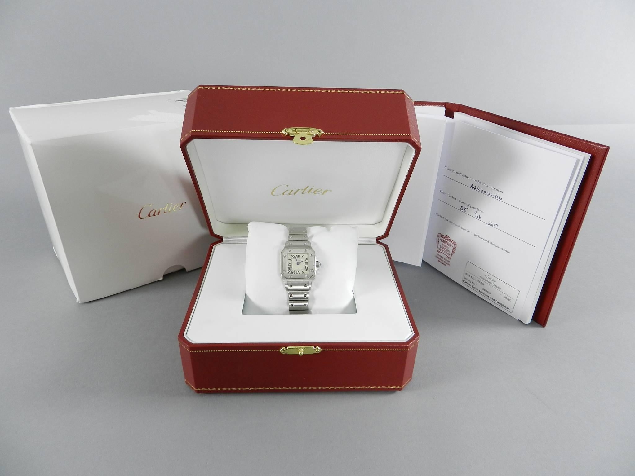 Cartier ladies santos galbee stainless steel watch. Reference number W20056D6.  Size small 25mm. Excellent pre-owned condition (worn only a few times) with box, packaging, and authenticity certificate dated February 28, 2017. Retail price currently